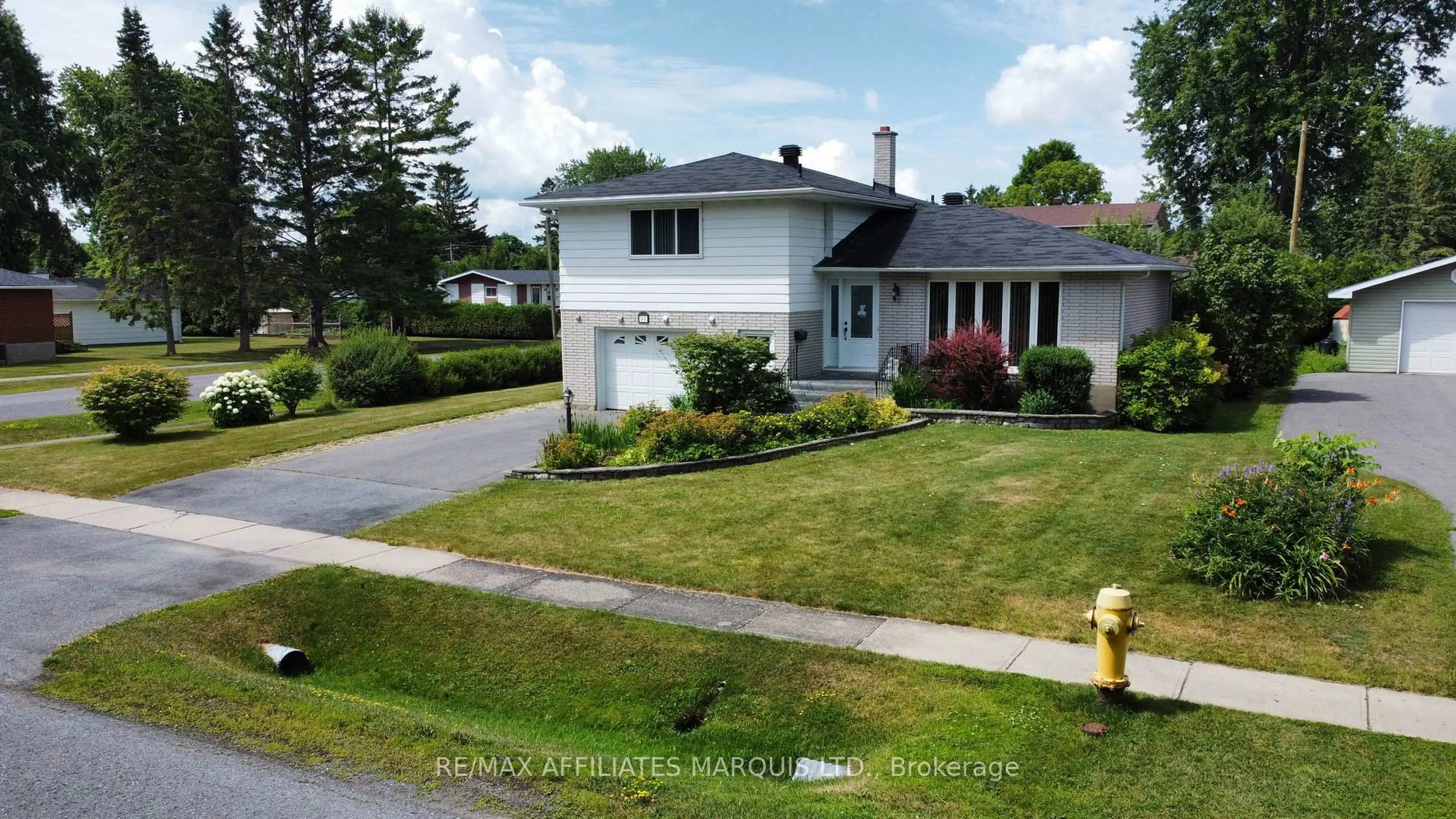 A pic from outside/outdoor area/front of a property/back of a property/a pic from drone, street for 11 Ault Dr, South Stormont Ontario K0C 1M0