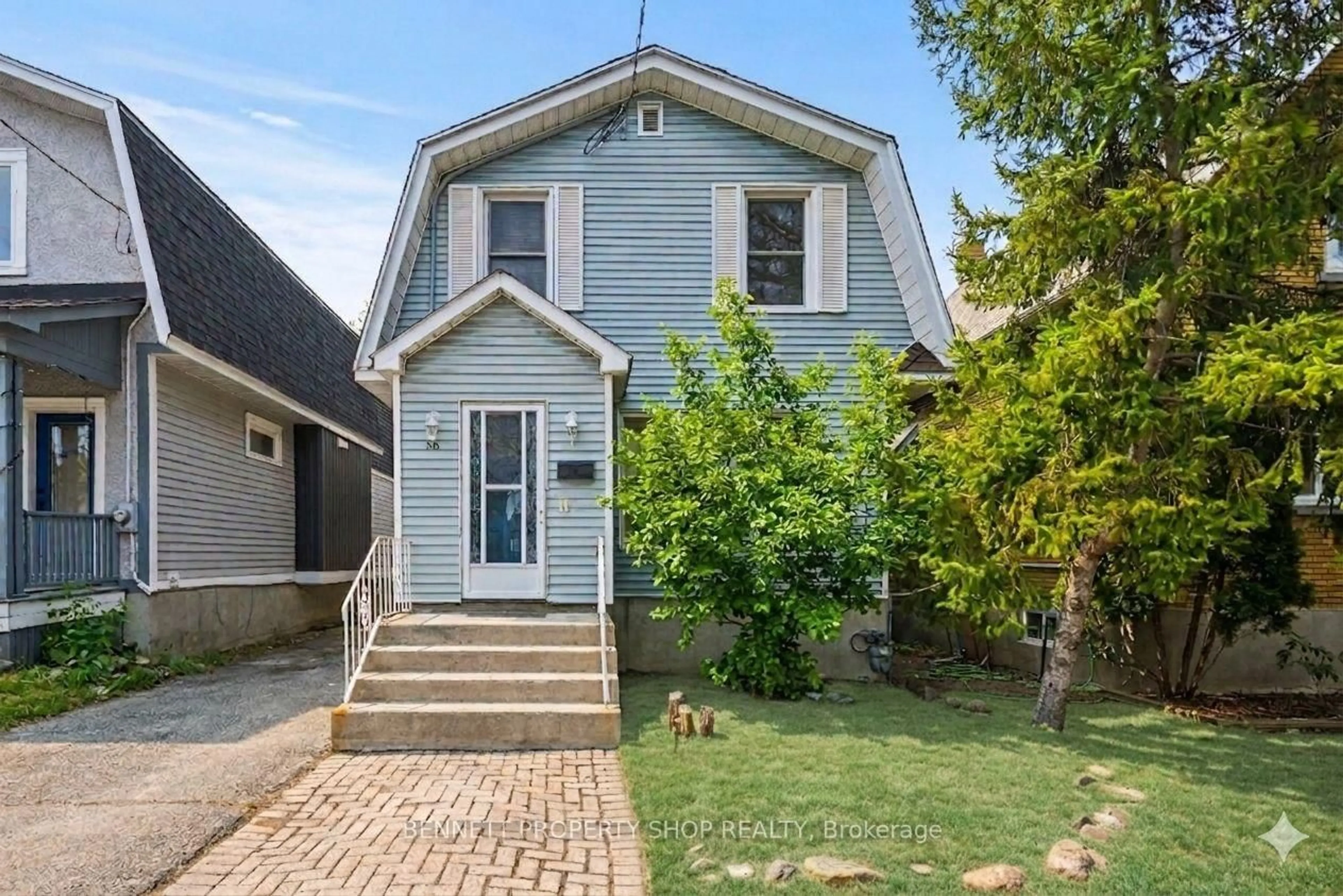 Home with vinyl exterior material, street for 56 Smirle Ave, Ottawa Ontario K1Y 0S1