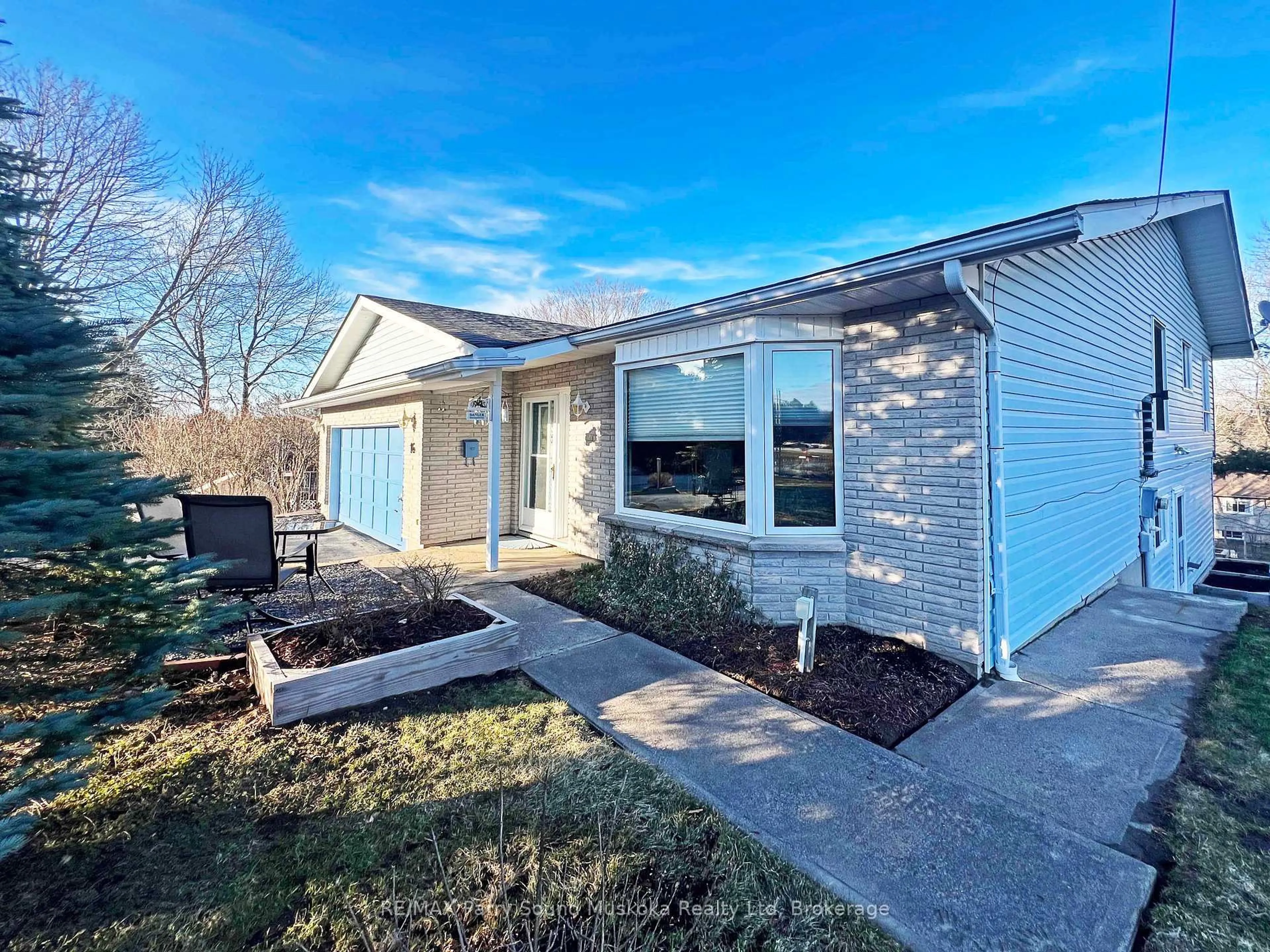 Home with vinyl exterior material, street for 16 Macklaim Dr, Parry Sound Ontario P2A 2Z2