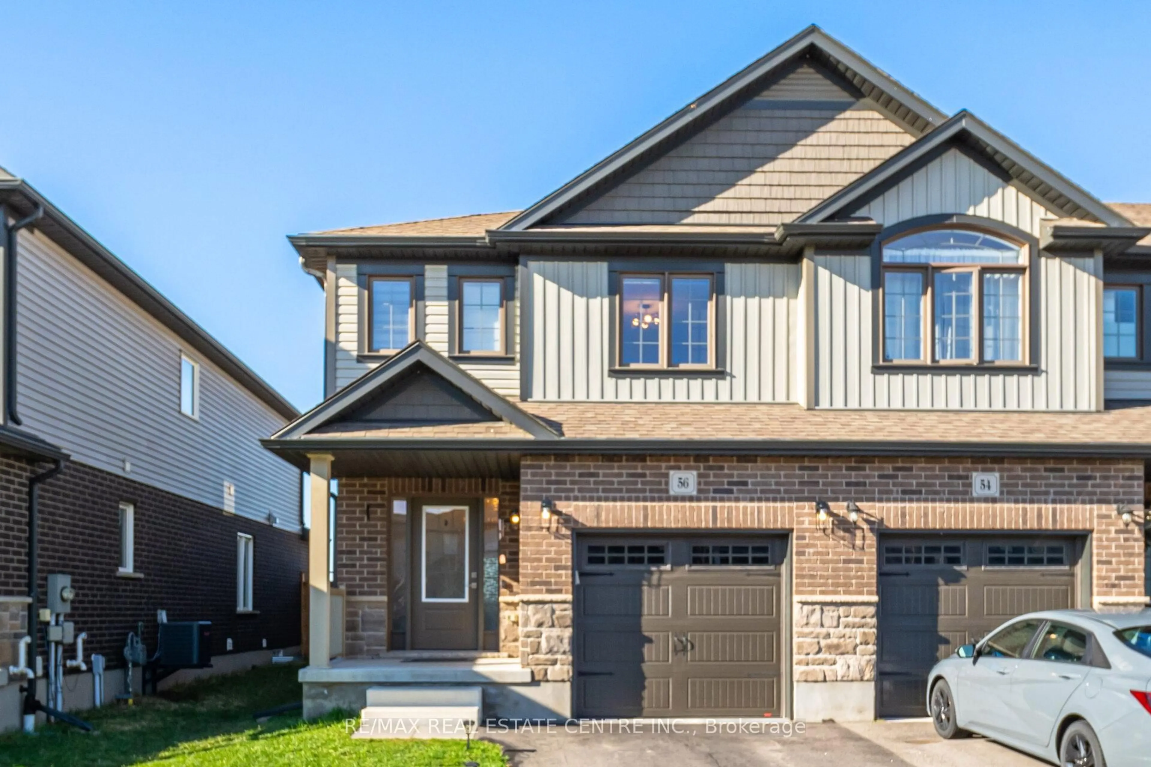 Home with vinyl exterior material, street for 56 Miranda Path, Woolwich Ontario N3B 0A1