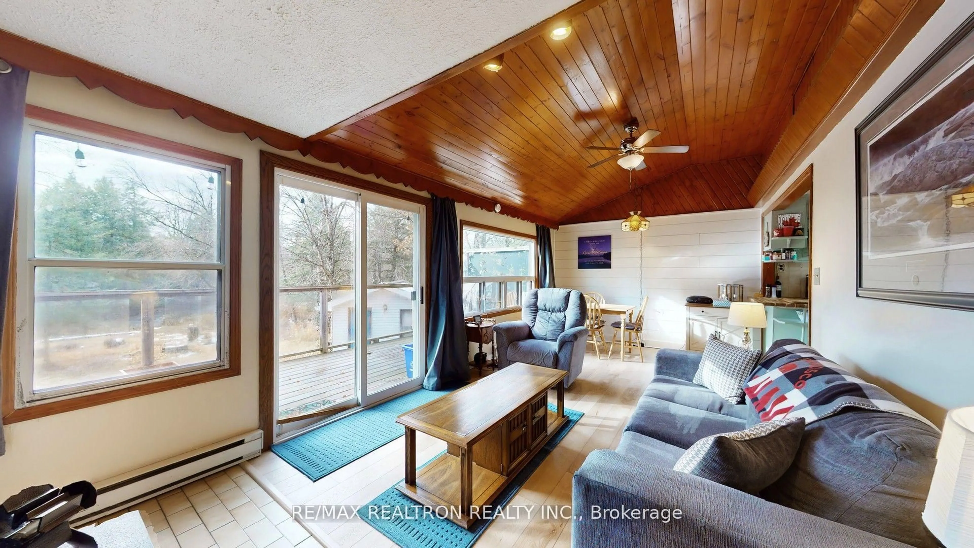 Living room with furniture, wood/laminate floor for 286 Edwina Dr, Trent Lakes Ontario K0M 1A0