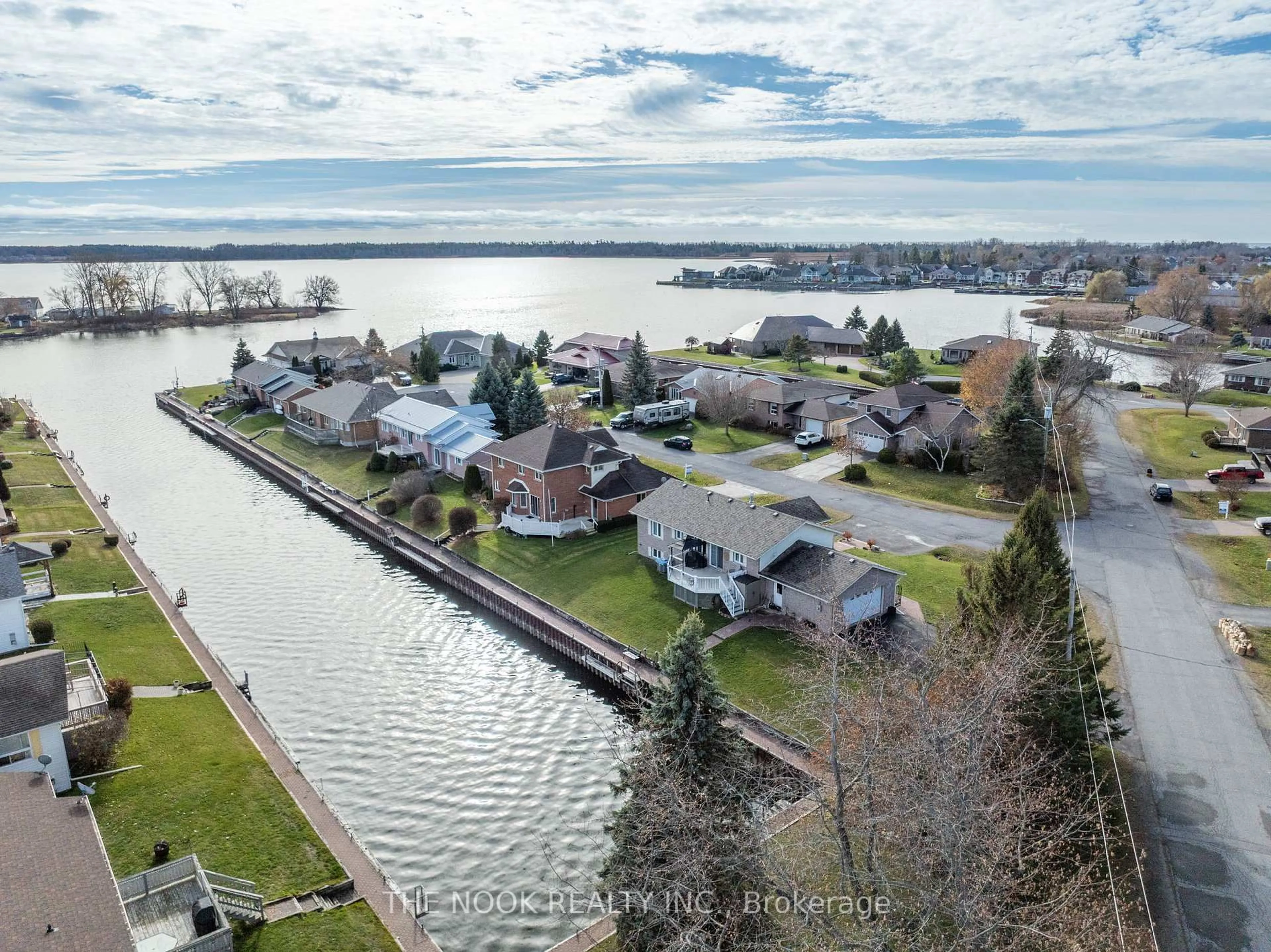 A pic from outside/outdoor area/front of a property/back of a property/a pic from drone, water/lake/river/ocean view for 12 Rogers Rd, Brighton Ontario K0K 1H0