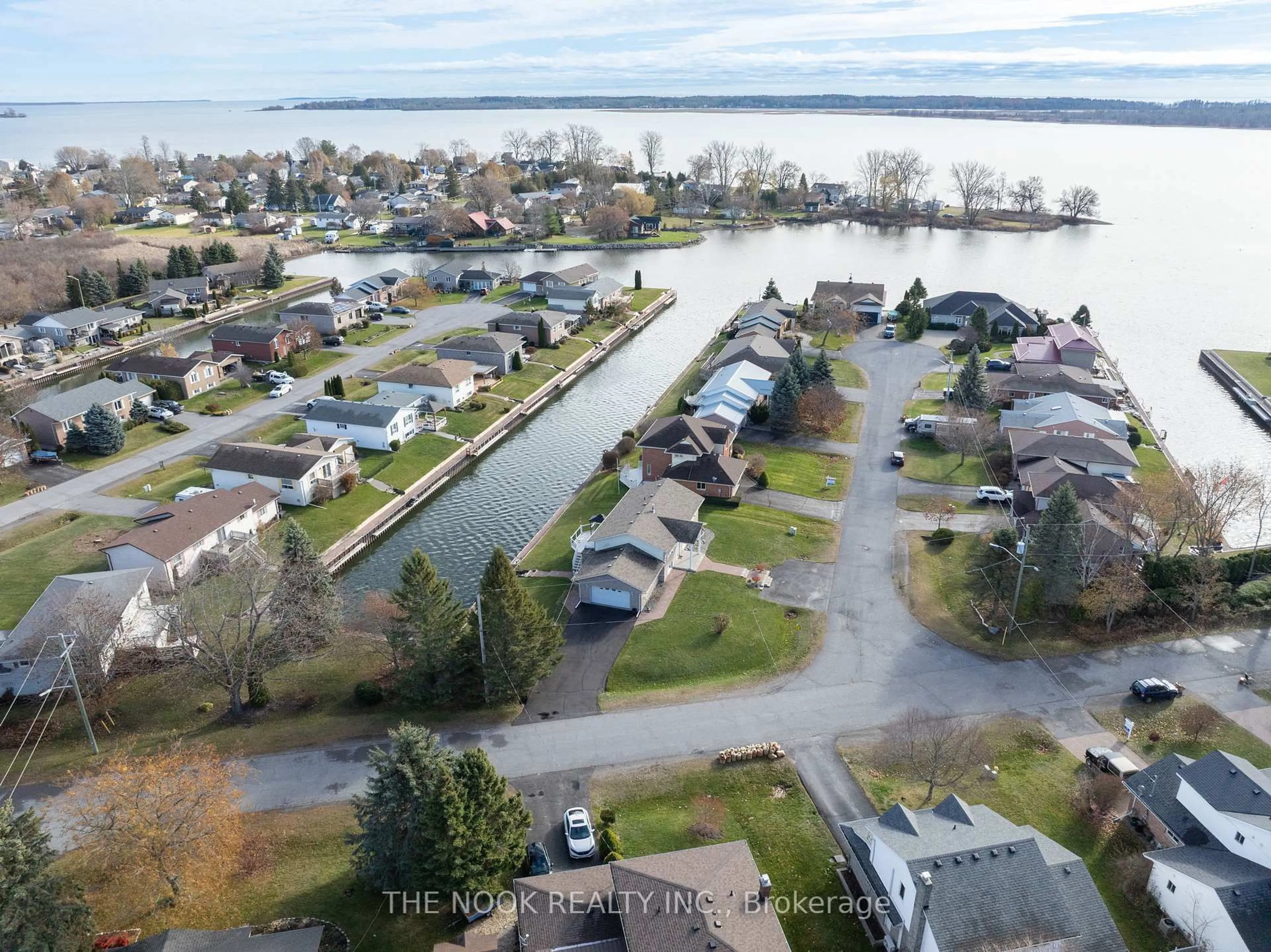 A pic from outside/outdoor area/front of a property/back of a property/a pic from drone, water/lake/river/ocean view for 12 Rogers Rd, Brighton Ontario K0K 1H0
