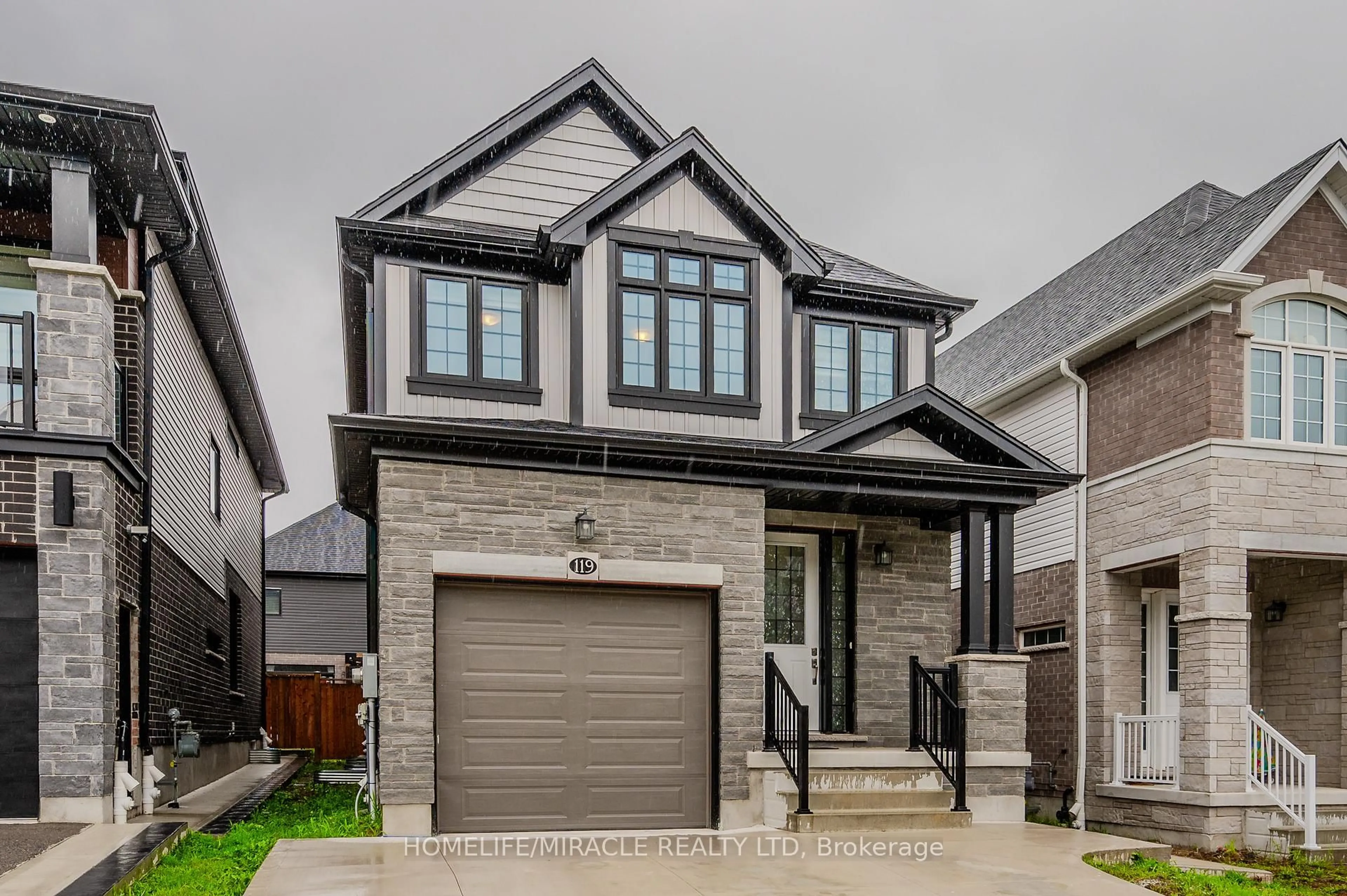 Home with brick exterior material, street for 119 Monarch woods Dr, Kitchener Ontario N2P 0K2