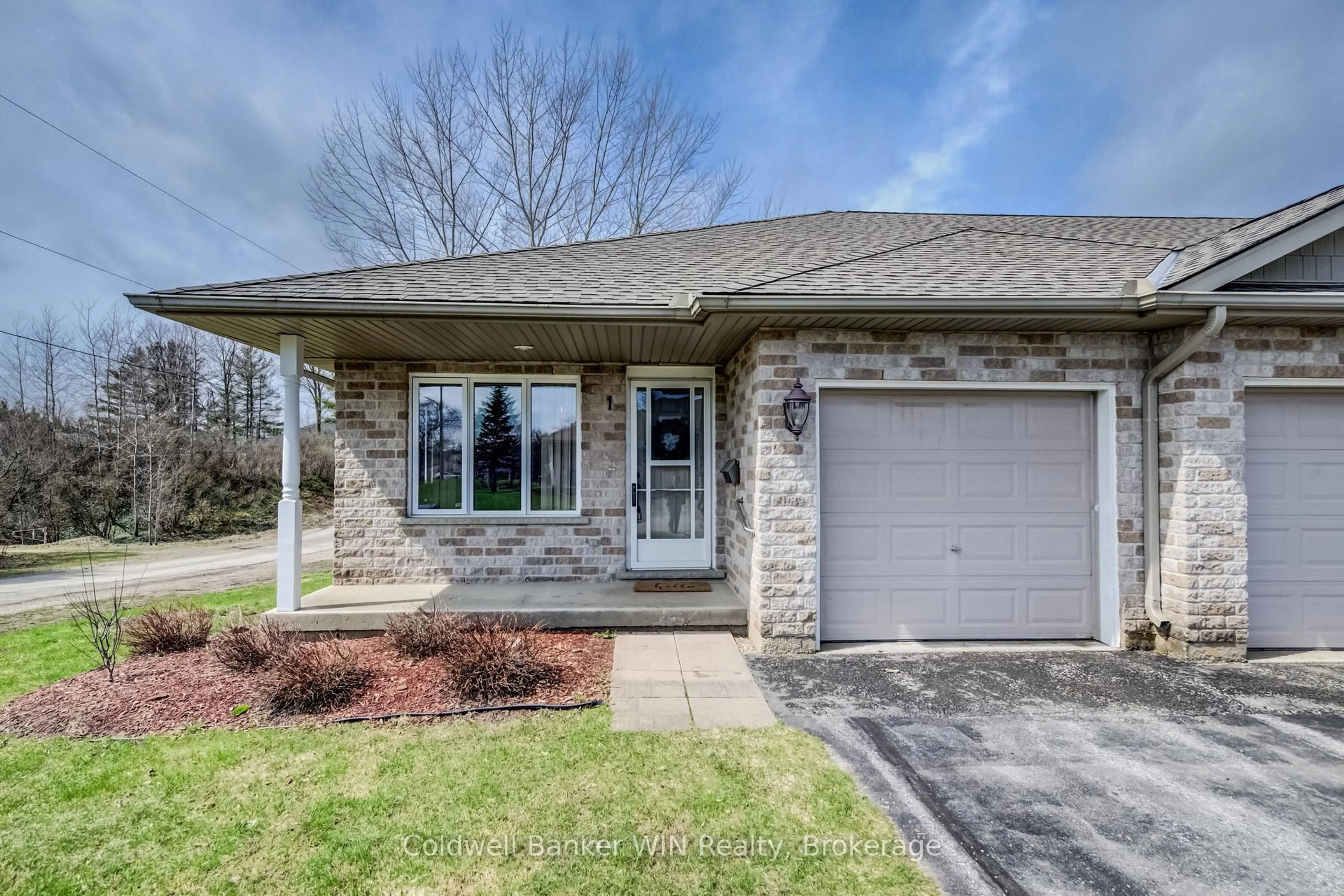 Home with brick exterior material, street for 302 Park St #1, West Grey Ontario N0G 1R0