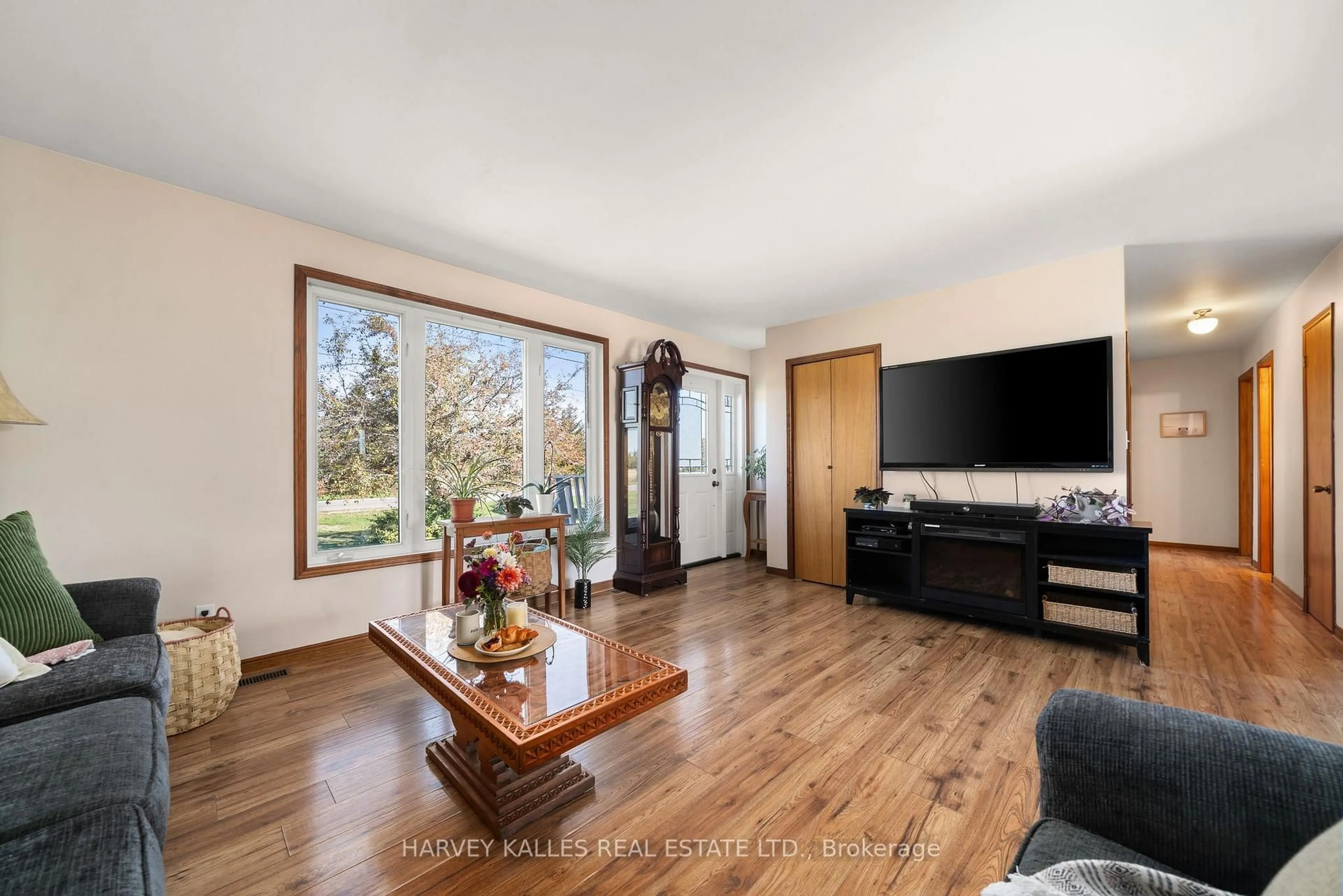 Living room with furniture, wood/laminate floor for 198 Welbanks Rd, Prince Edward County Ontario K0K 1P0