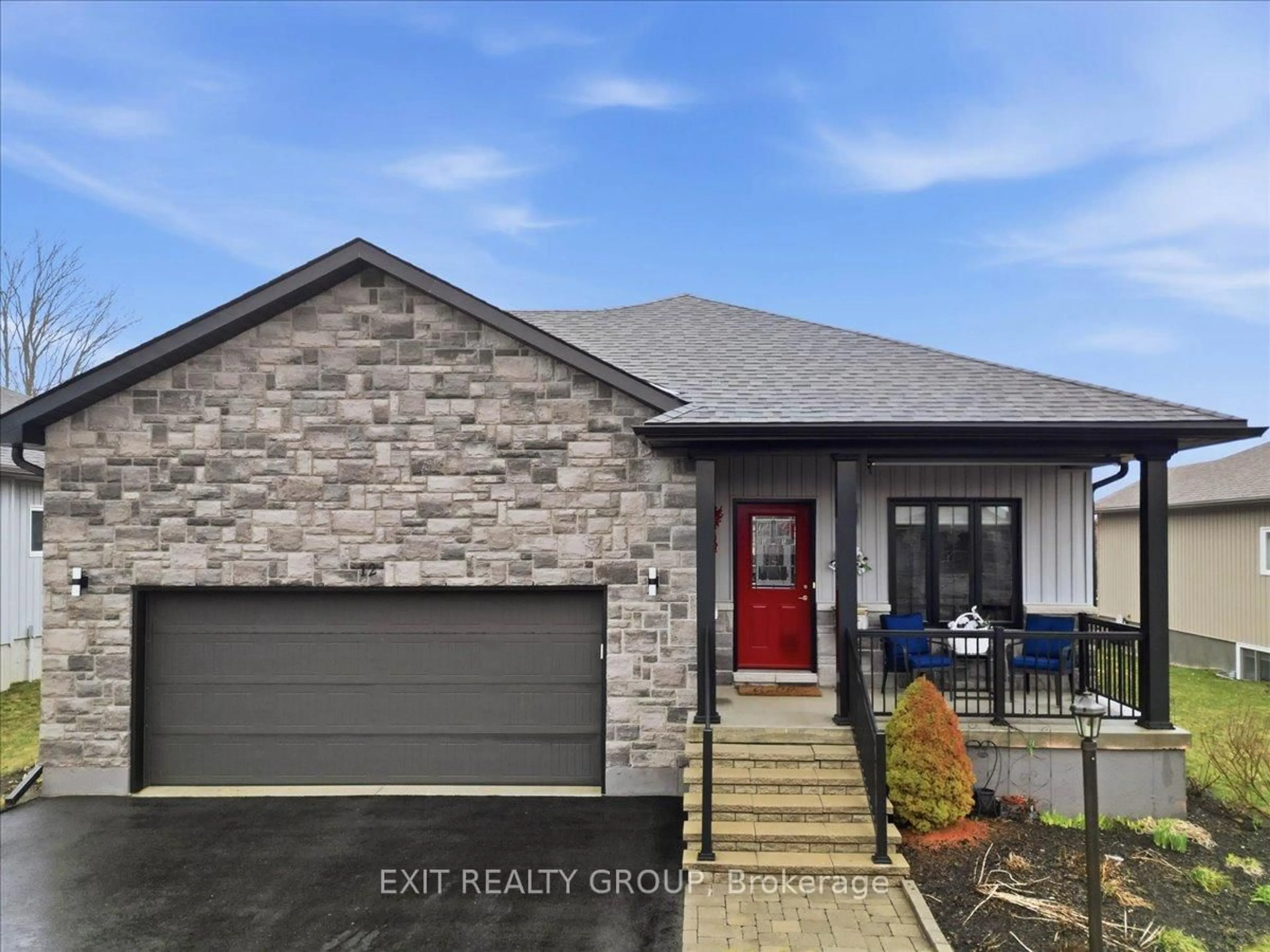 Home with brick exterior material, street for 12 Dorchester Dr, Prince Edward County Ontario K0K 3L0