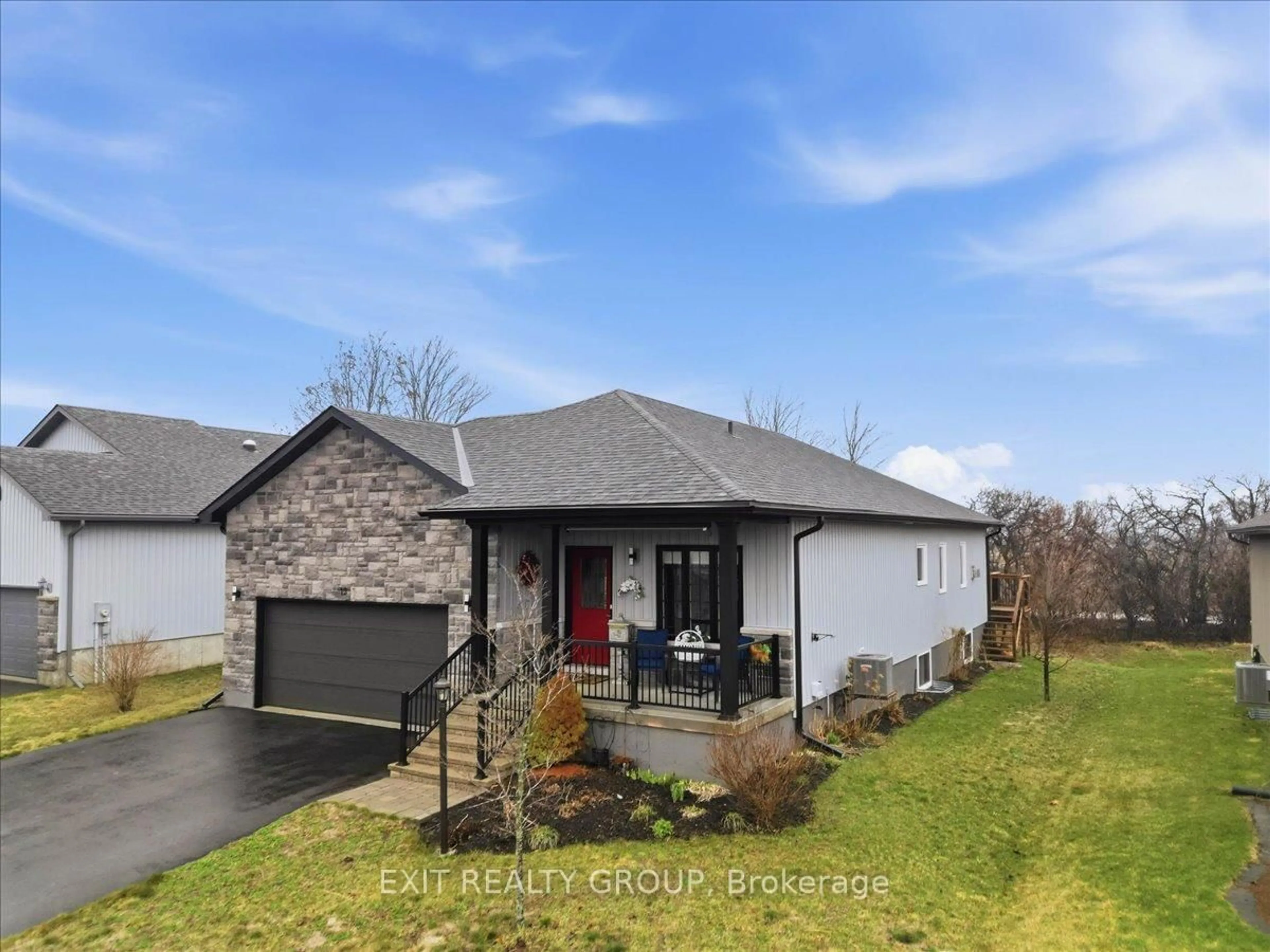 A pic from outside/outdoor area/front of a property/back of a property/a pic from drone, street for 12 Dorchester Dr, Prince Edward County Ontario K0K 3L0