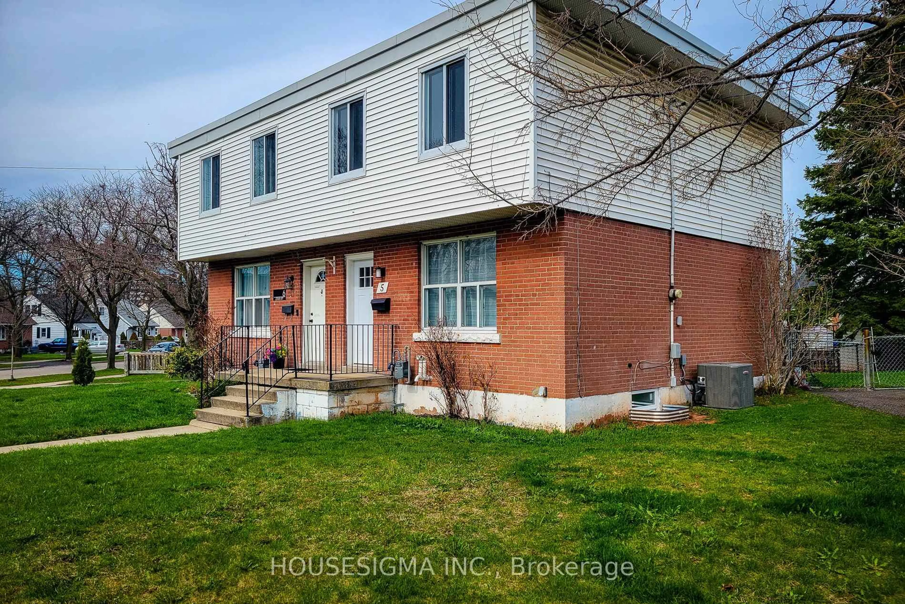 Home with brick exterior material, street for 5 Martha St, Hamilton Ontario L8H 2B7