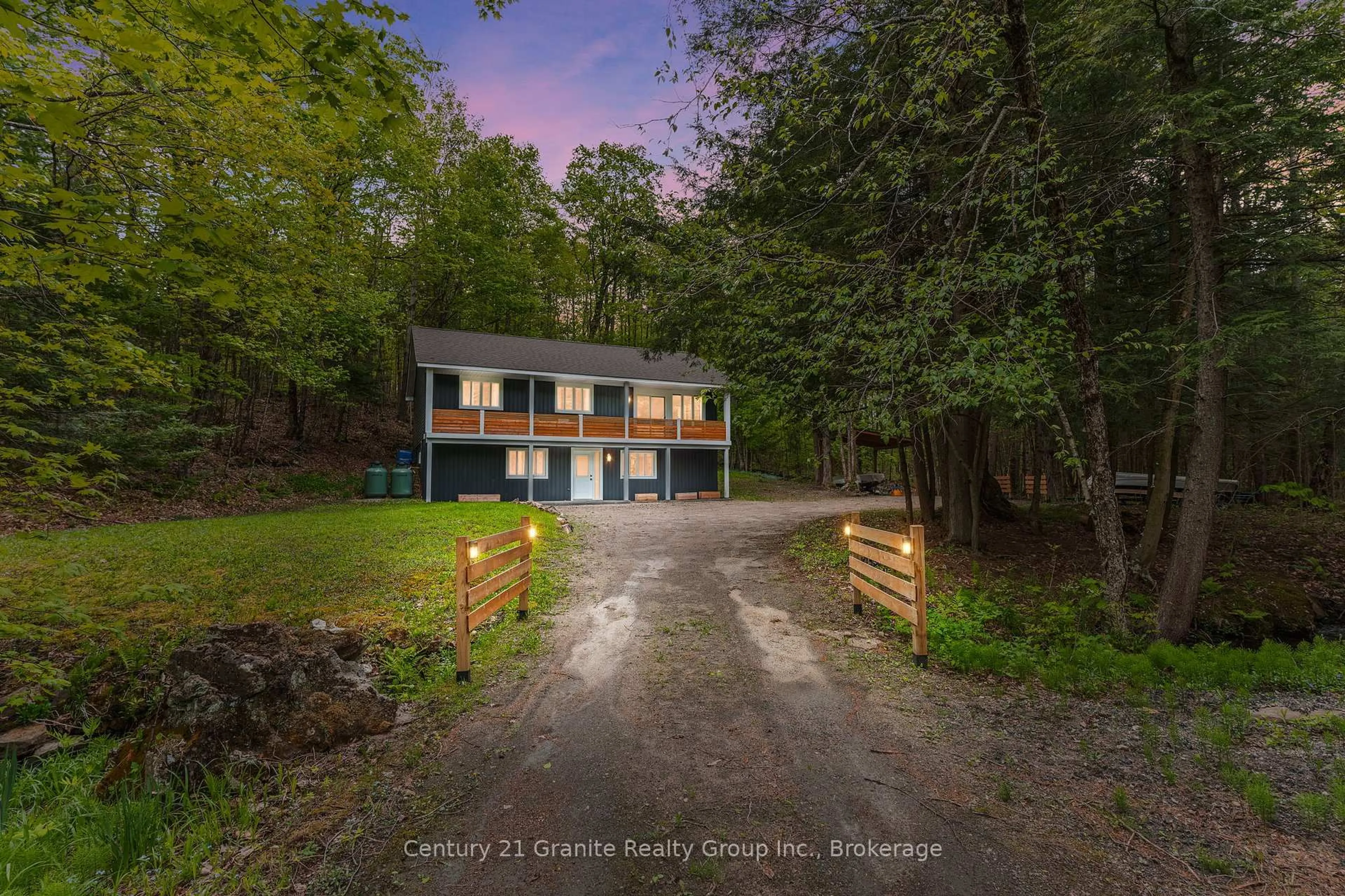 A pic from outside/outdoor area/front of a property/back of a property/a pic from drone, unknown for 7032 County Road 121, Minden Hills Ontario K0M 2K0