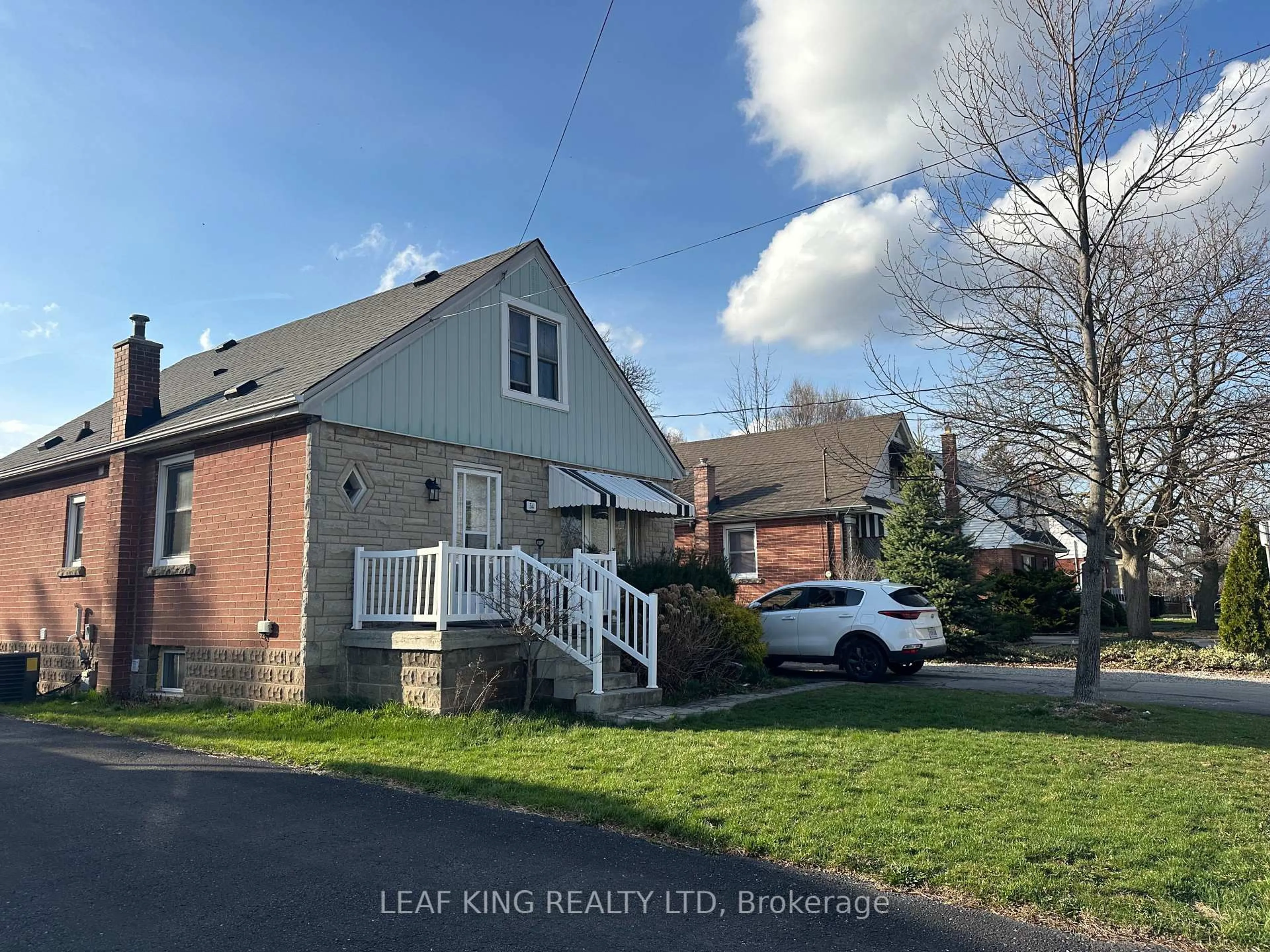 A pic from outside/outdoor area/front of a property/back of a property/a pic from drone, street for 54 West 1st St, Hamilton Ontario L9C 3C1