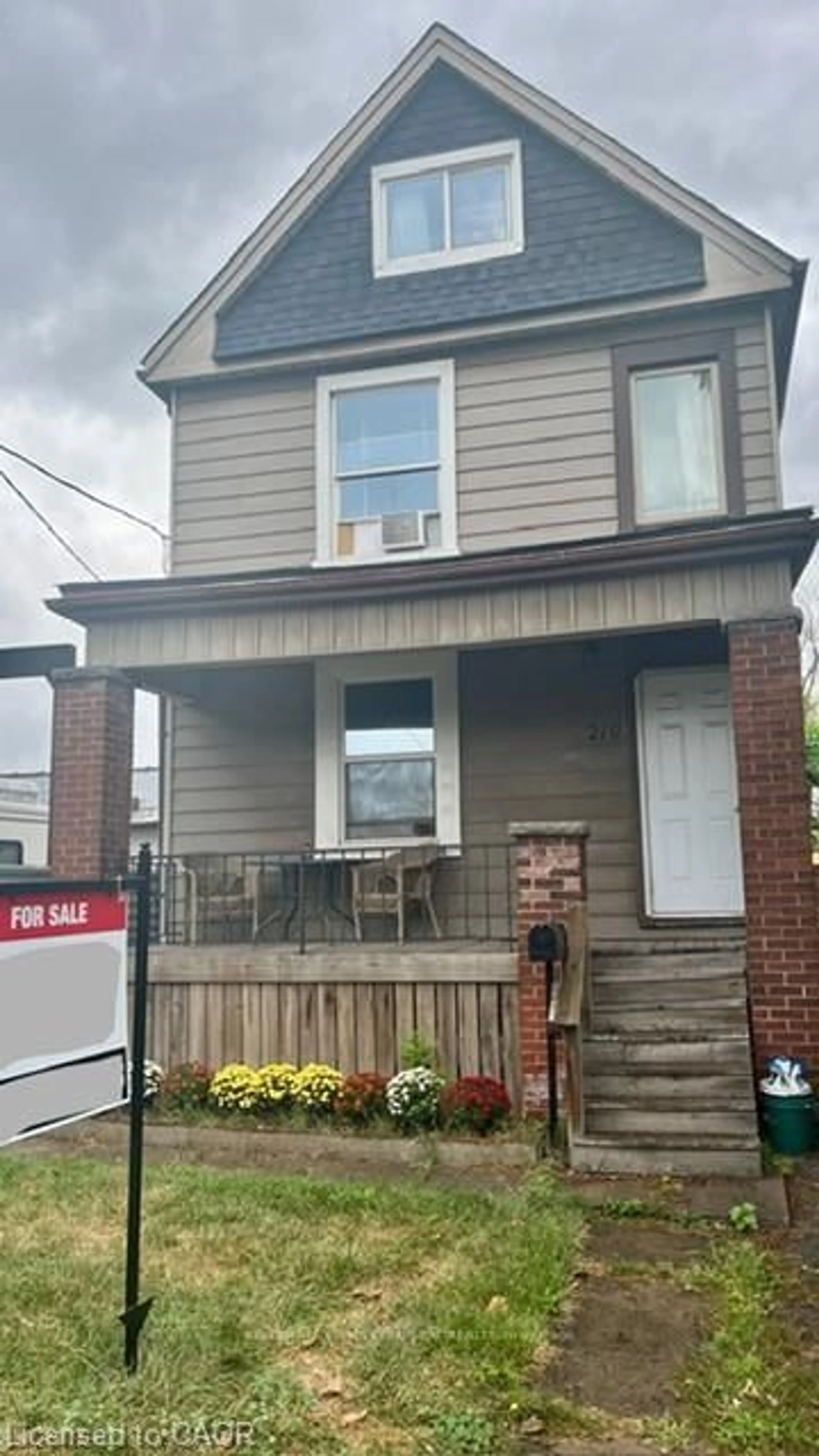 Home with brick exterior material, street for 219 AVONDALE St, Hamilton Ontario L8L 7C4