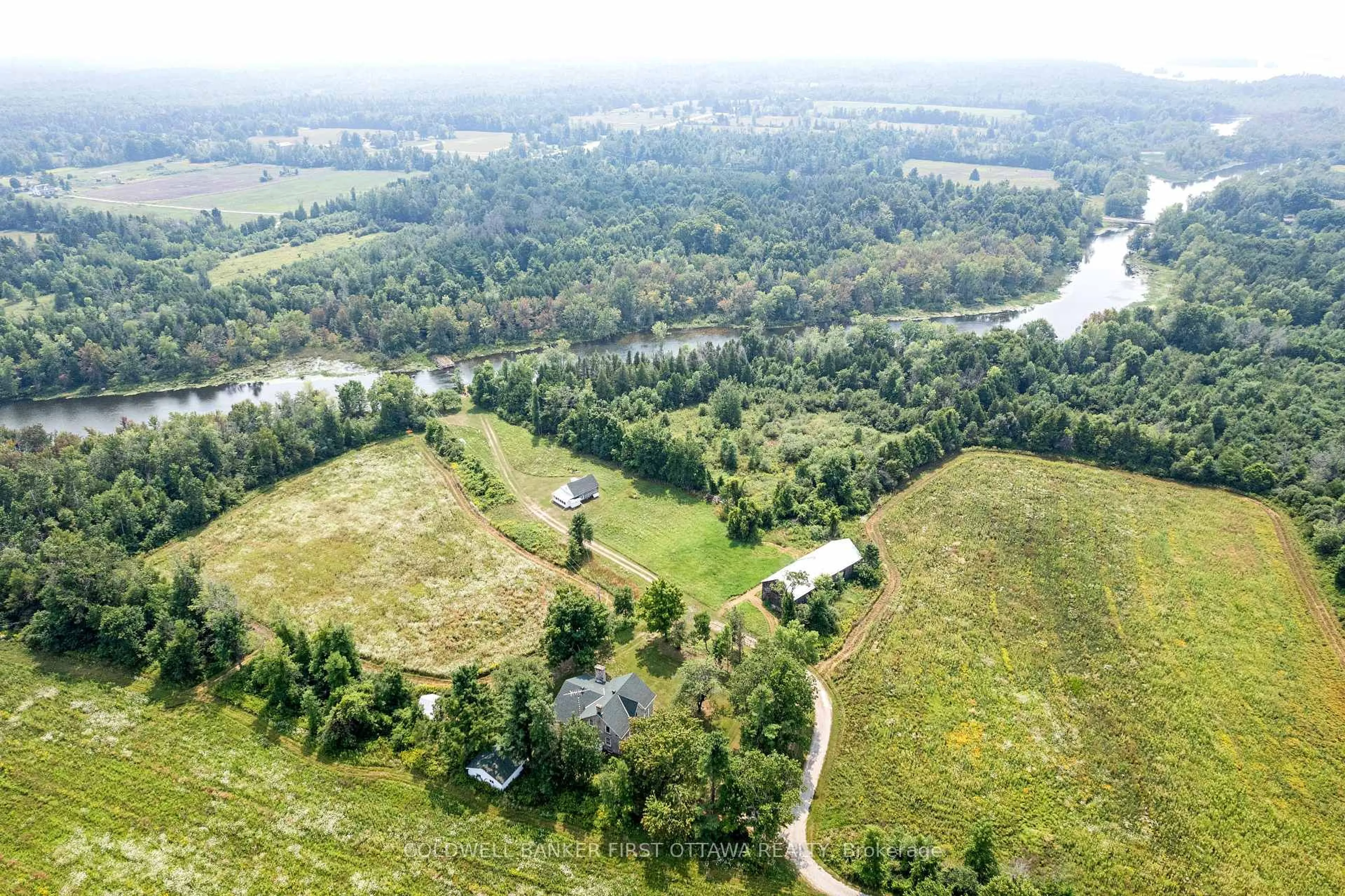 A pic from outside/outdoor area/front of a property/back of a property/a pic from drone, water/lake/river/ocean view for 2565 Christie Lake Rd, Perth Ontario K7H 3C6