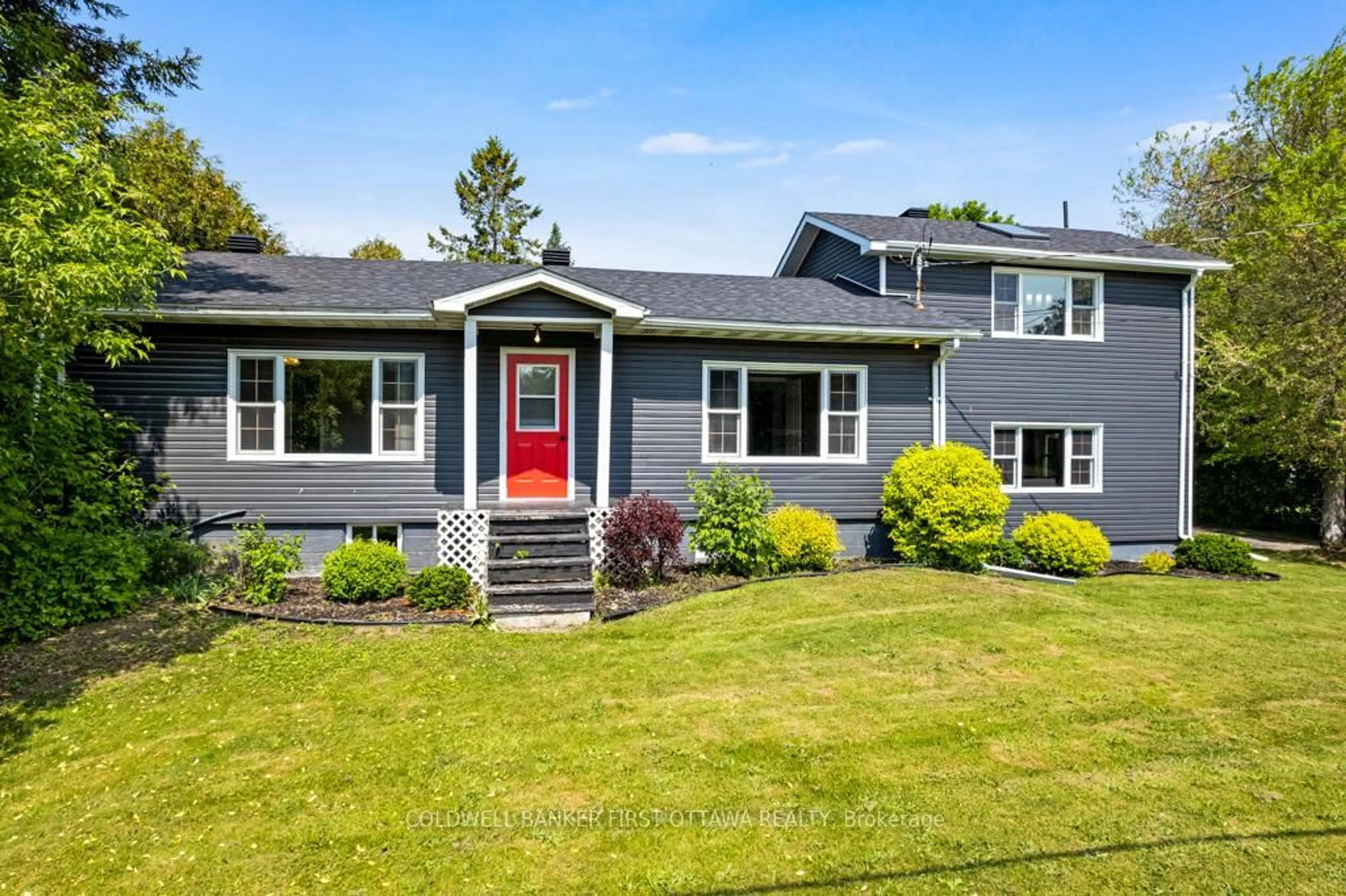 Home with vinyl exterior material, street for 352 Highway 15, Rideau Lakes Ontario K7A 0E5