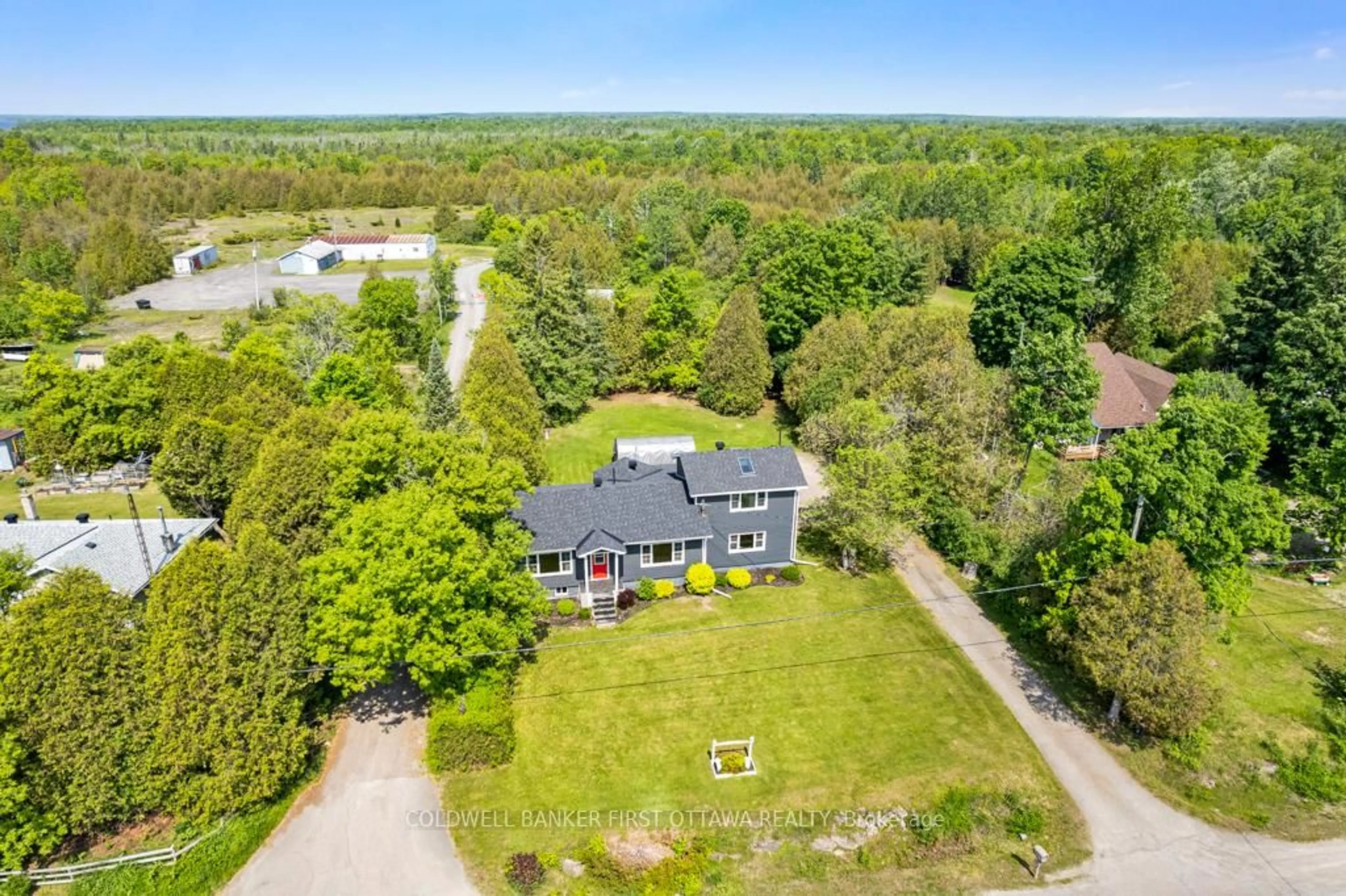 A pic from outside/outdoor area/front of a property/back of a property/a pic from drone, unknown for 352 Highway 15, Rideau Lakes Ontario K7A 0E5
