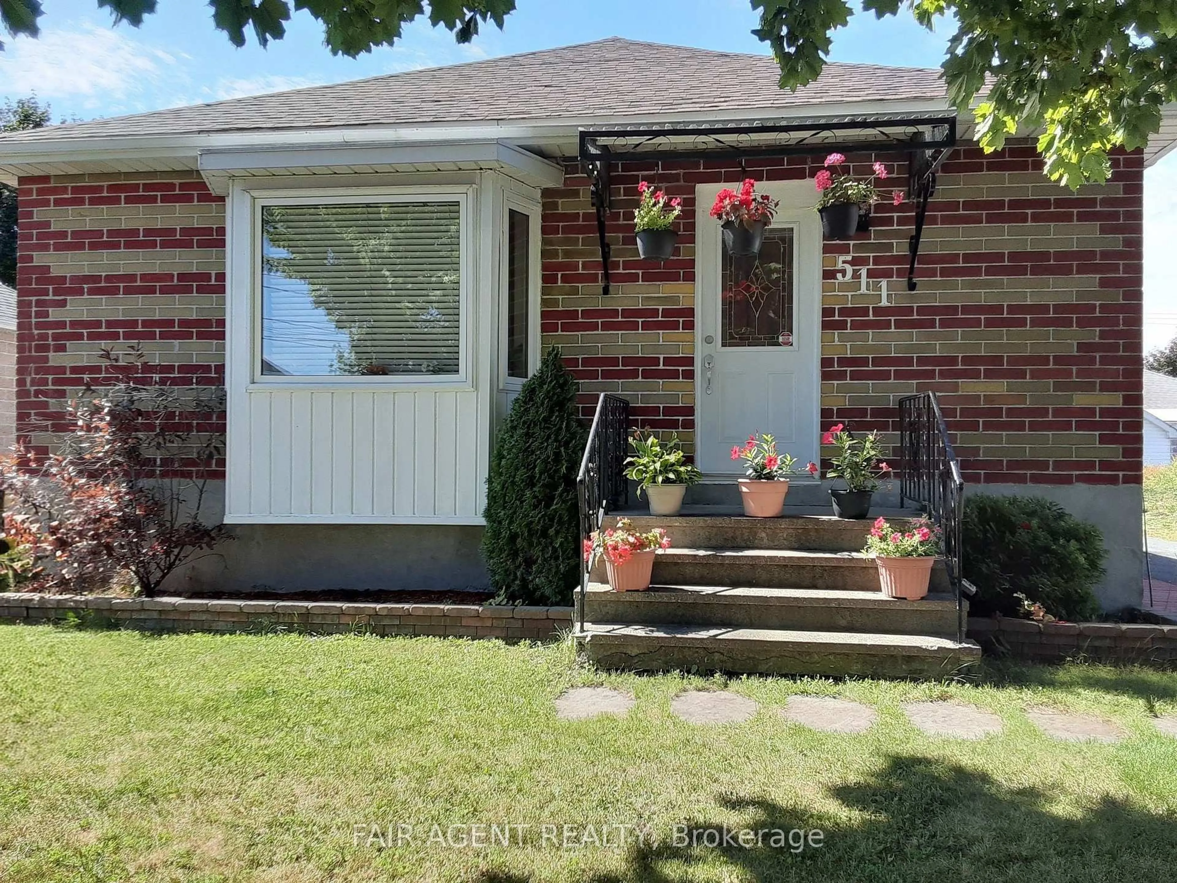 Home with brick exterior material, street for 511 St. Felix St, Cornwall Ontario K6H 5B2