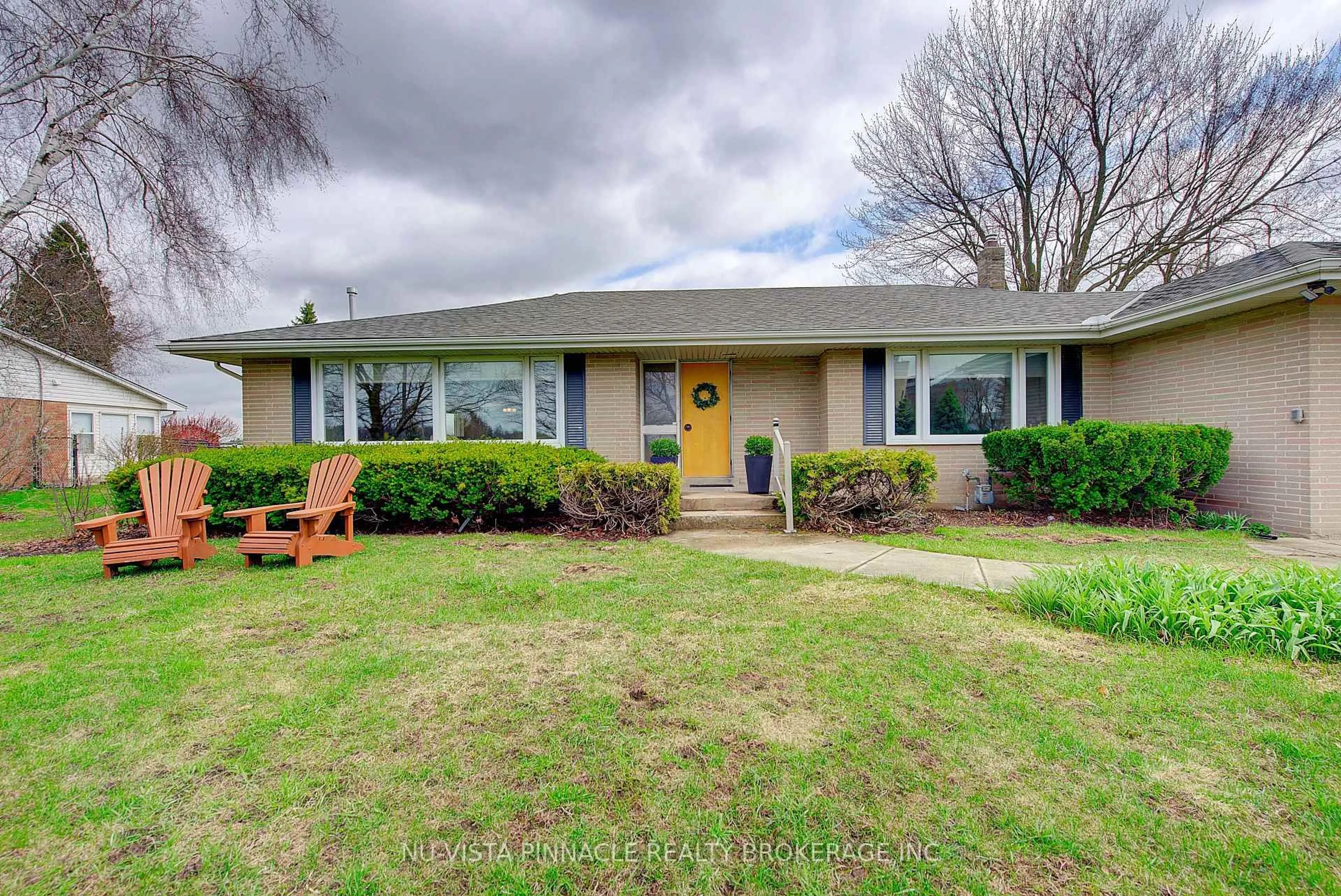 A pic from outside/outdoor area/front of a property/back of a property/a pic from drone, street for 21752 Richmond St, Middlesex Centre Ontario N5X 4B2