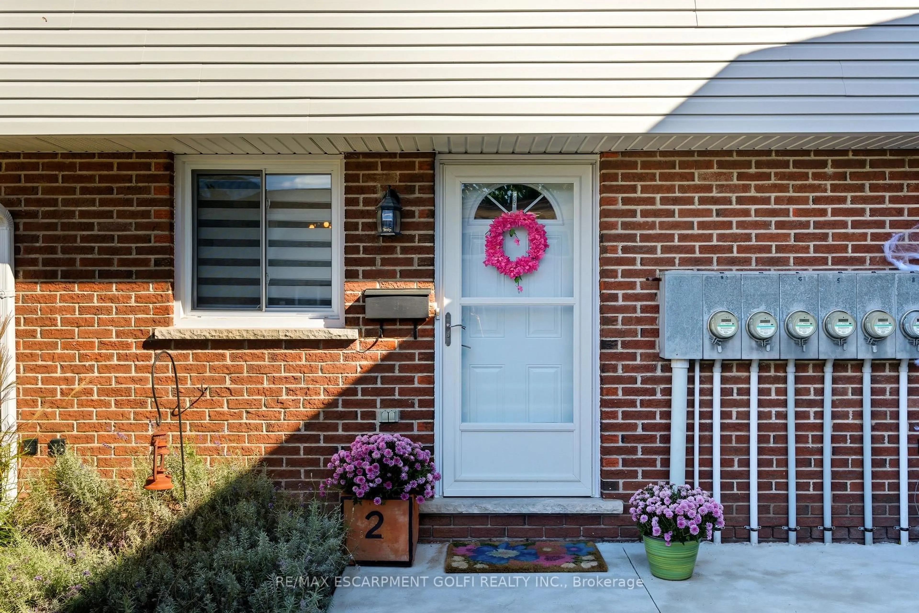 Home with brick exterior material, street for 63 EMPIRE St #2, Welland Ontario L3B 2L3