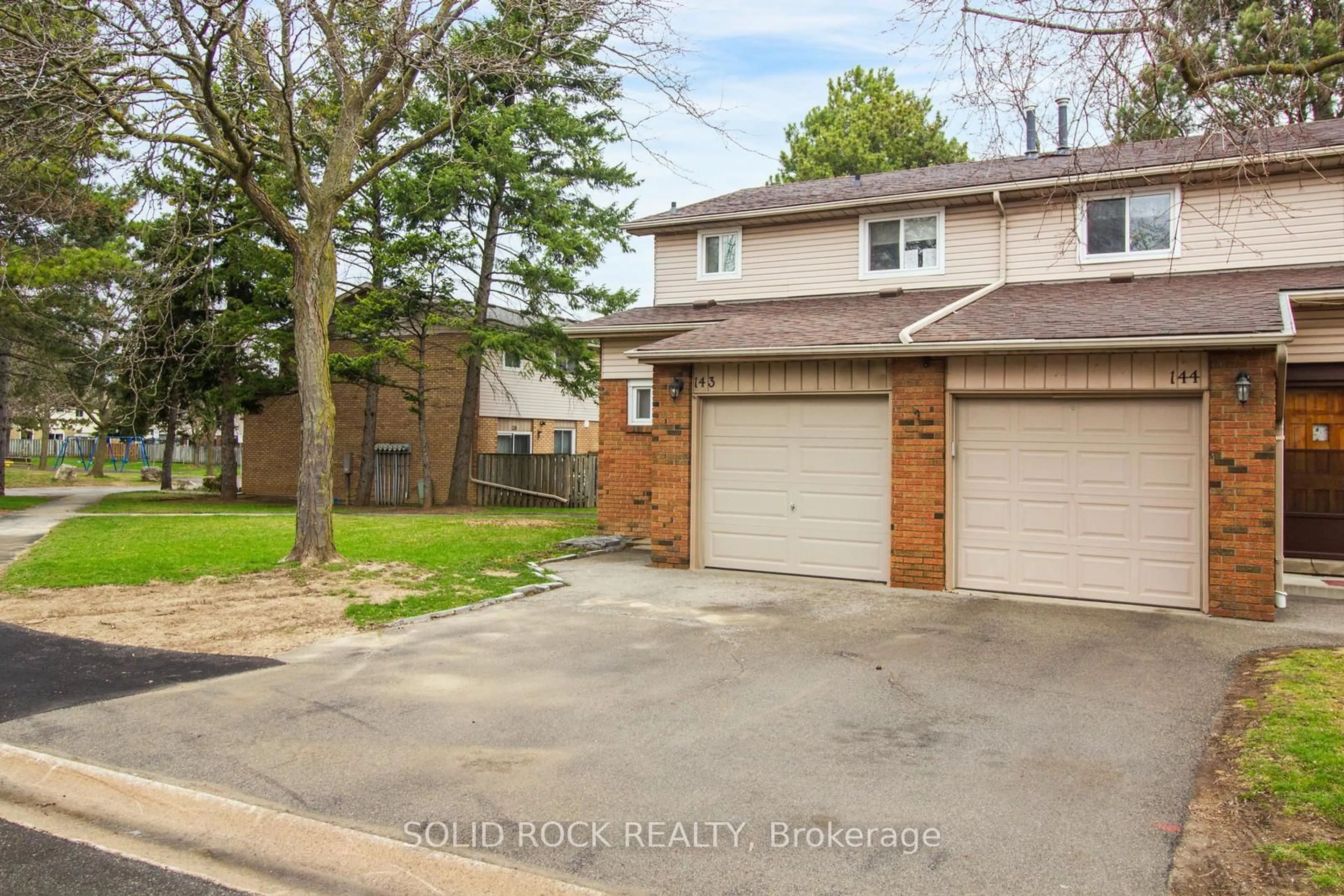A pic from outside/outdoor area/front of a property/back of a property/a pic from drone, street for 100 Quigley Rd #143, Hamilton Ontario L8K 6J1