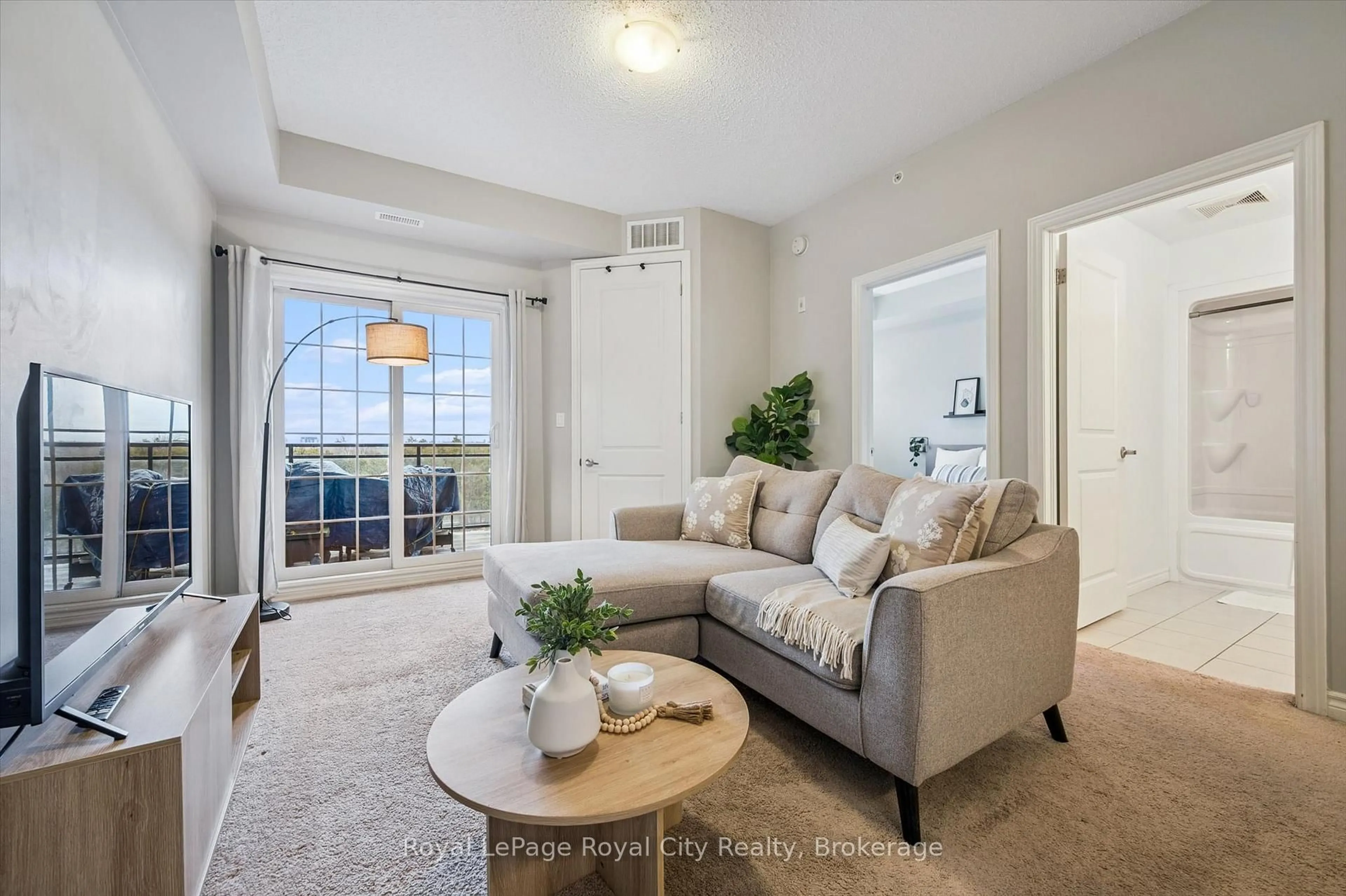 Living room with furniture, unknown for 1077 Gordon St #429, Guelph Ontario N1L 1H2