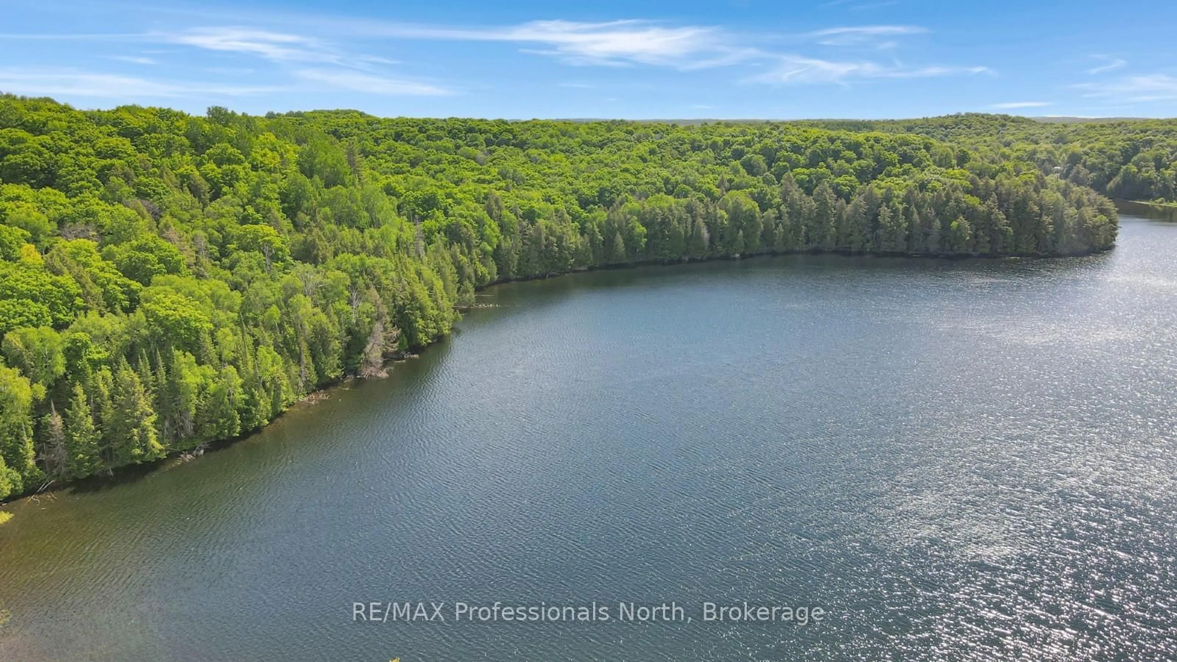 A pic from outside/outdoor area/front of a property/back of a property/a pic from drone, water/lake/river/ocean view for 1930 Trappers Tr, Dysart et al Ontario K0M 1S0