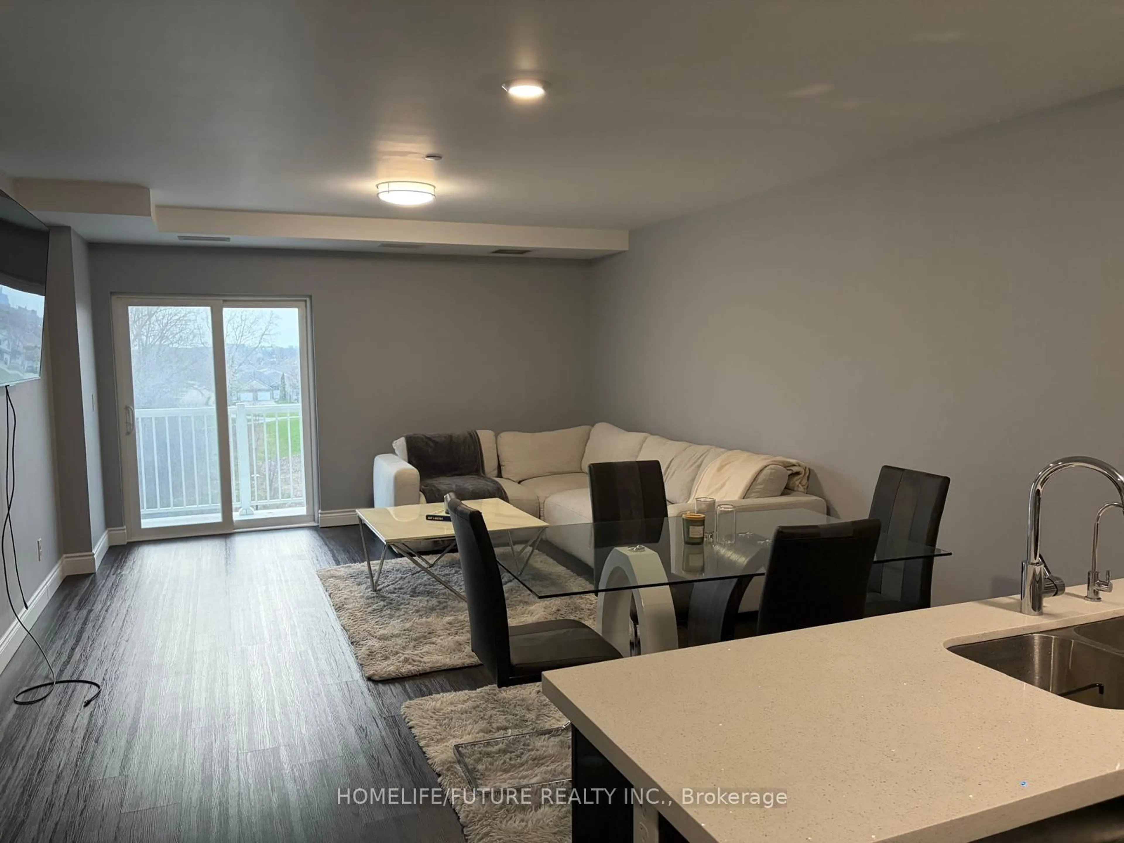 Living room with furniture, unknown for 1489 Banwell Rd #519, Windsor Ontario N8P 0G4