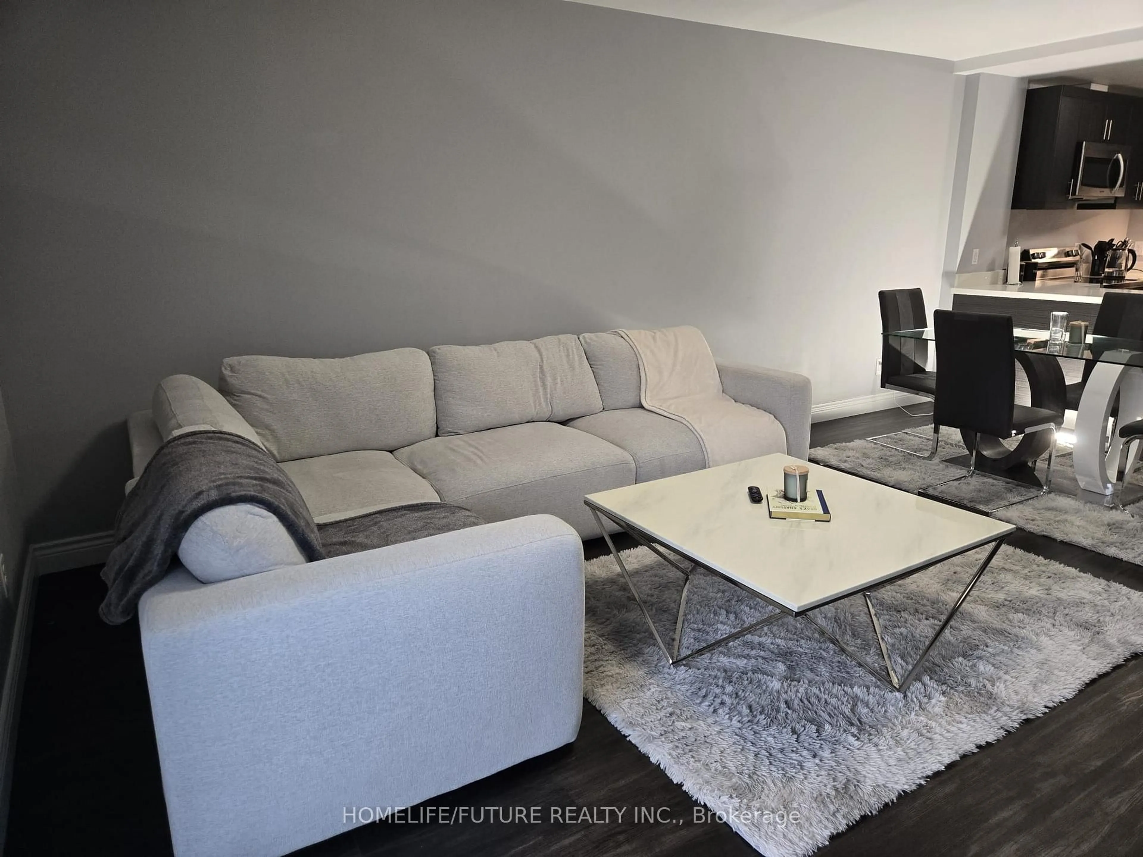 Living room with furniture, unknown for 1489 Banwell Rd #519, Windsor Ontario N8P 0G4