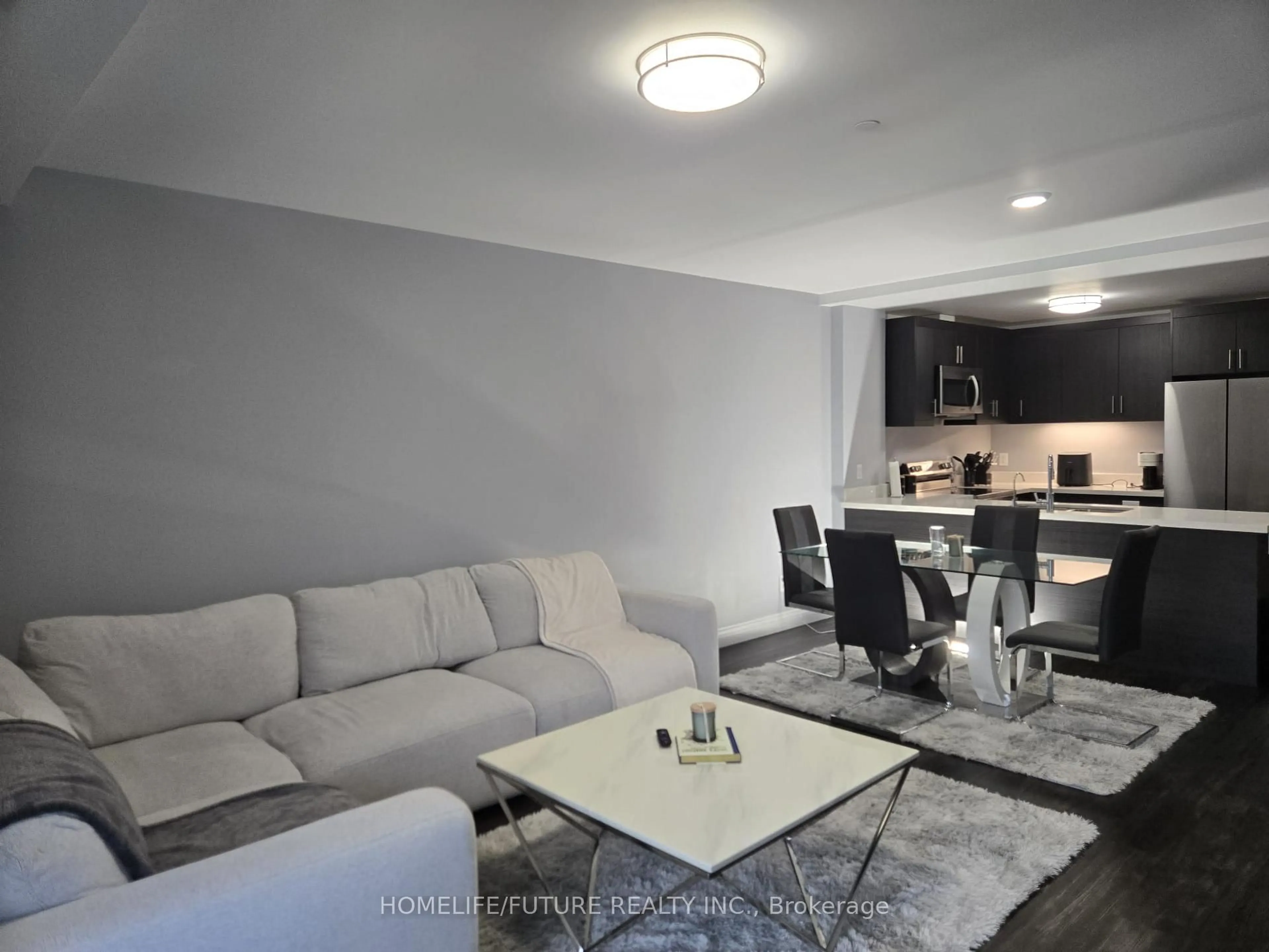 Living room with furniture, unknown for 1489 Banwell Rd #519, Windsor Ontario N8P 0G4