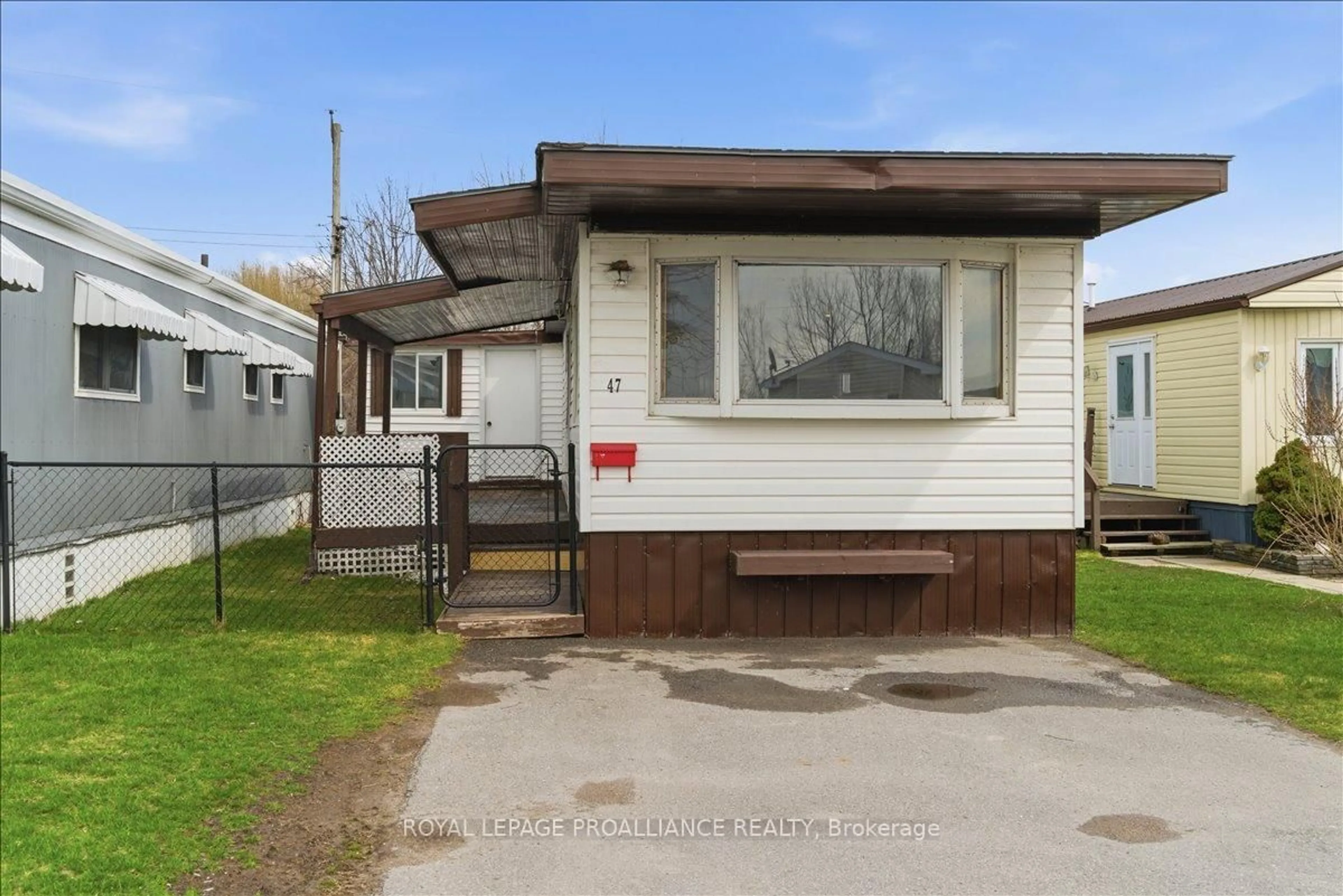 Home with vinyl exterior material, street for 311 Dundas St #47, Quinte West Ontario K8V 3E5