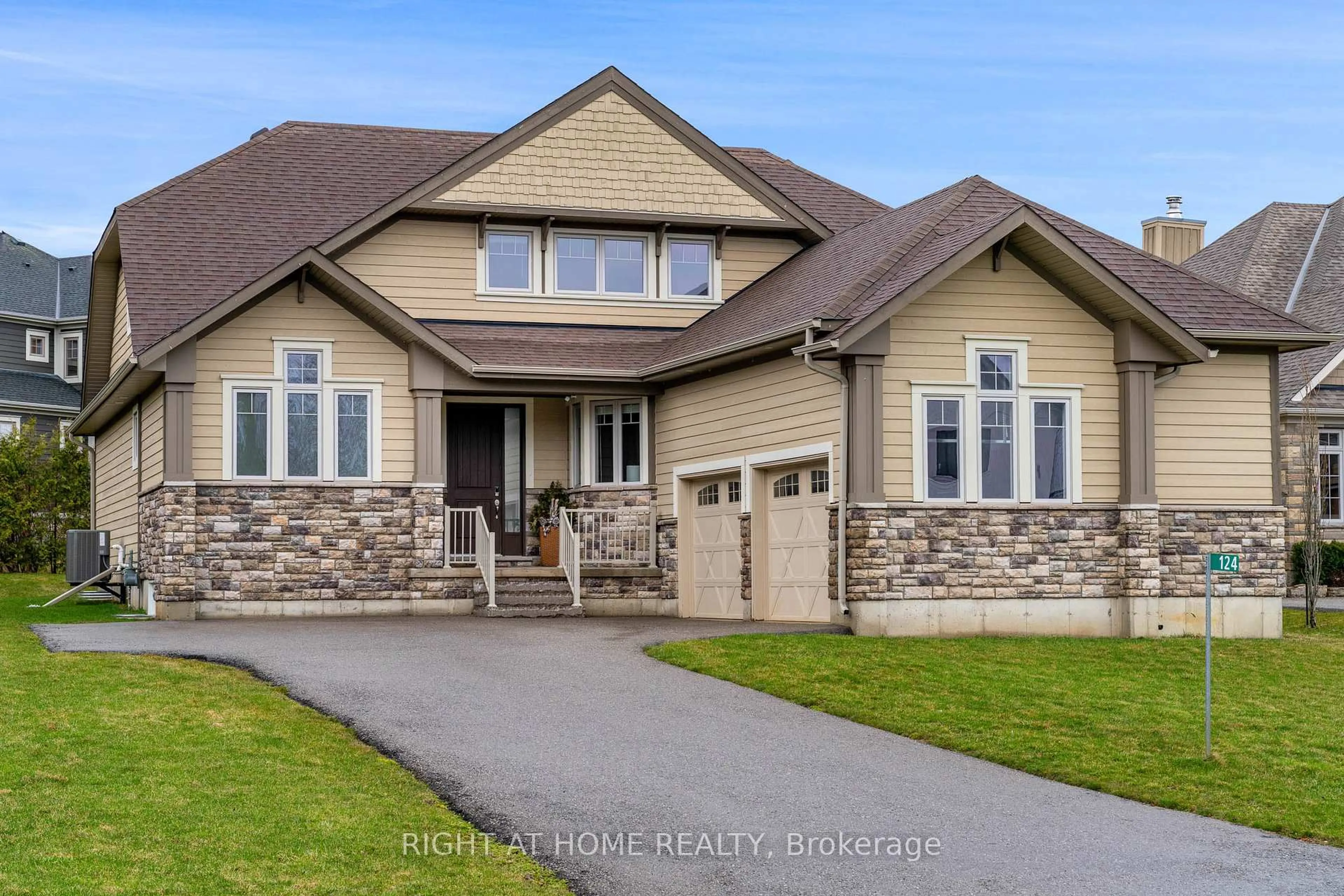 Home with brick exterior material, street for 124 West Ridge Dr, Blue Mountains Ontario N0H 2P0