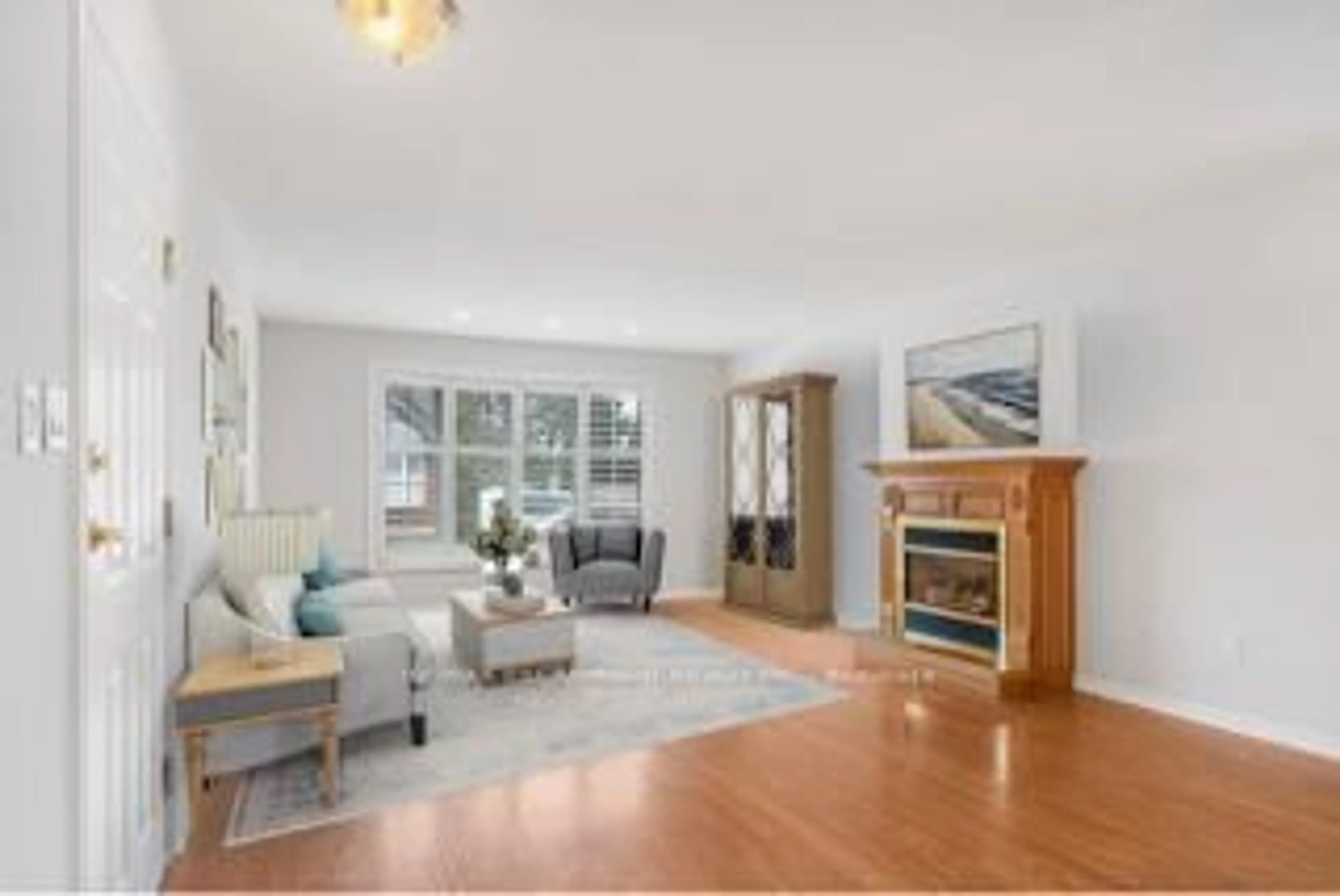 Living room with furniture, wood/laminate floor for 229 Lynden Rd #19, Brantford Ontario N3R 8A7