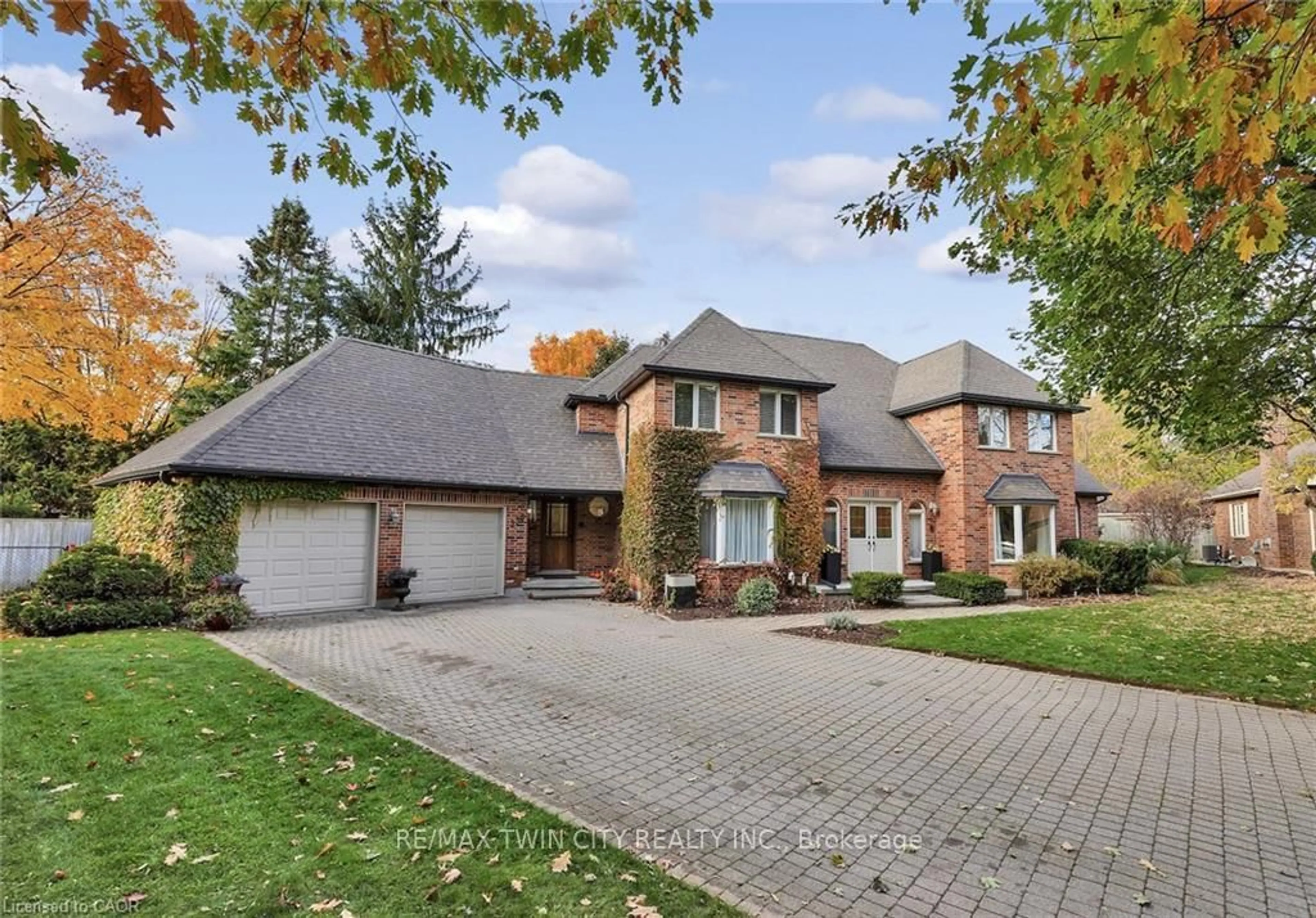 Home with brick exterior material, street for 250 Grey Squirrel Pl, Waterloo Ontario N2K 3H9