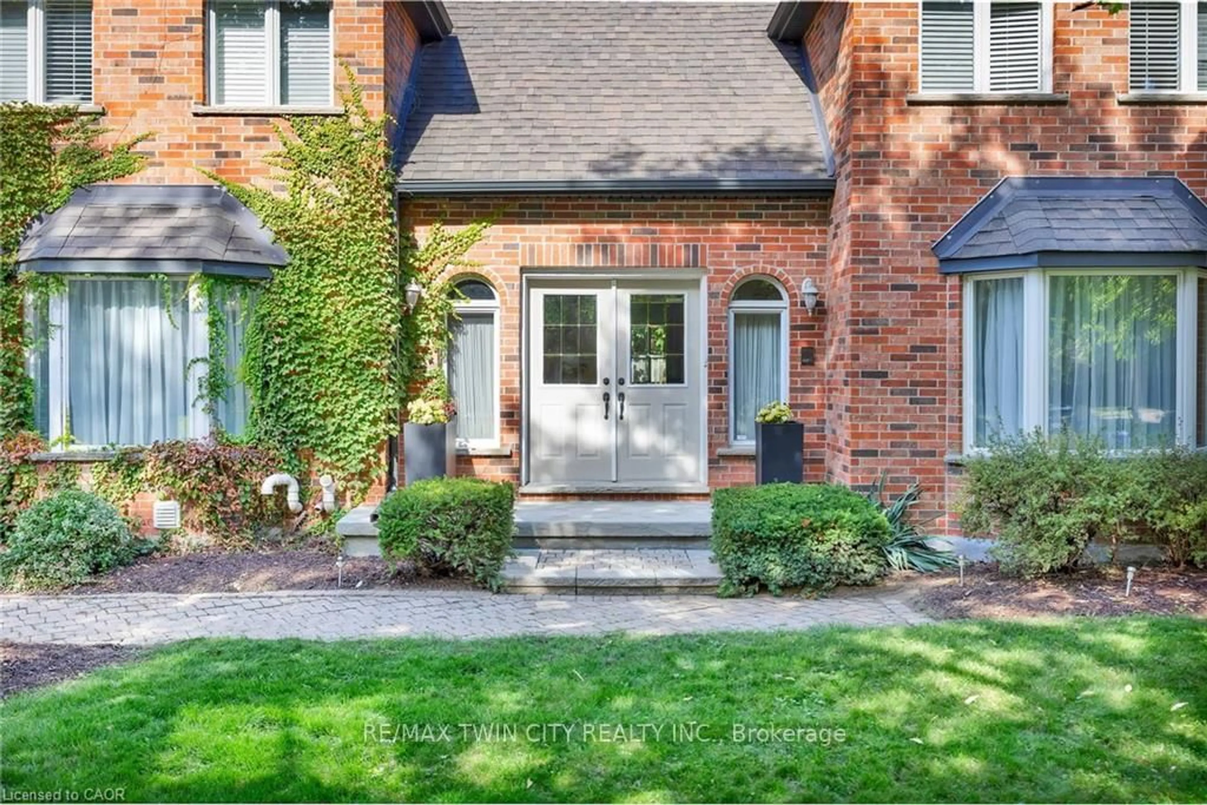 Home with brick exterior material, street for 250 Grey Squirrel Pl, Waterloo Ontario N2K 3H9