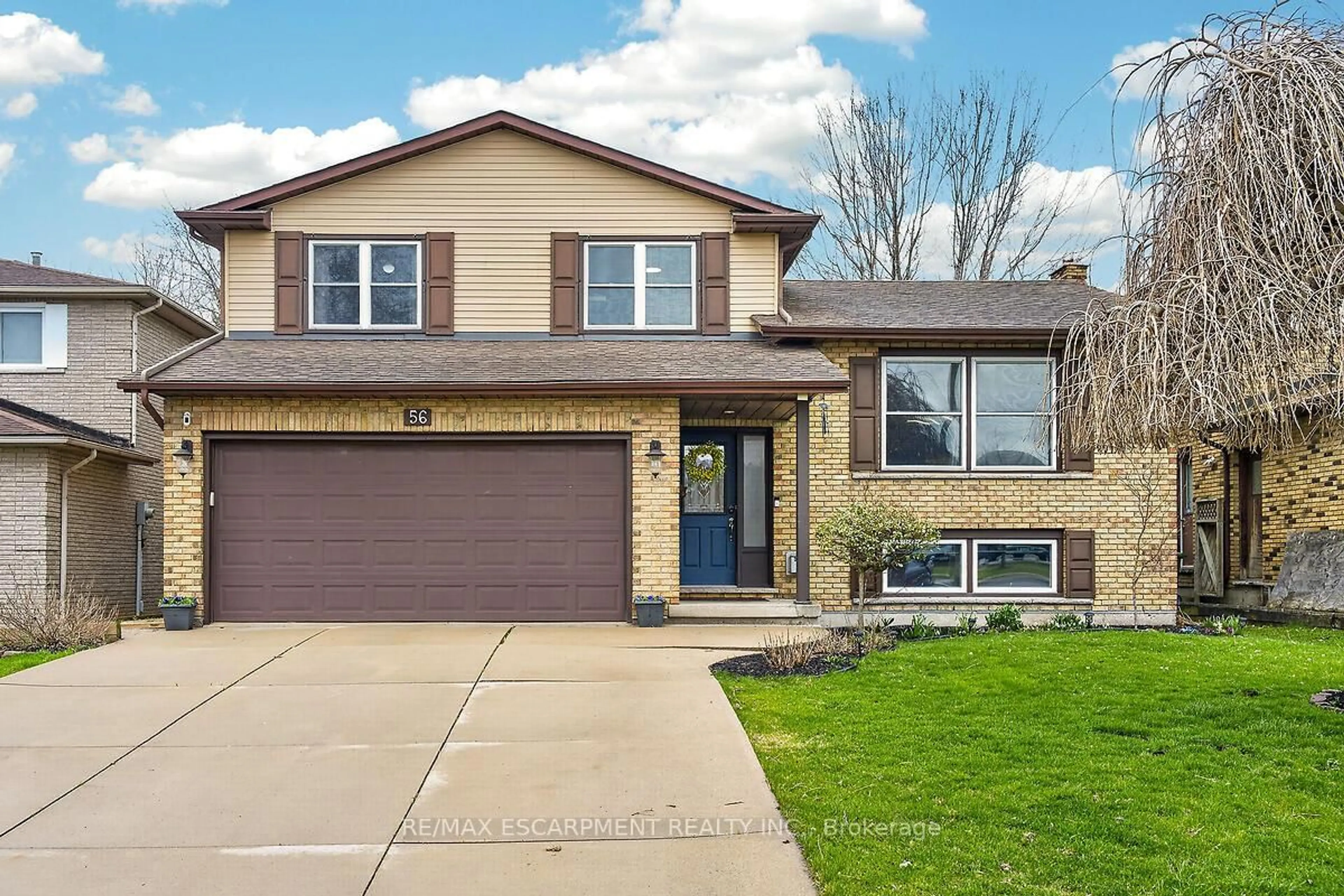 Home with brick exterior material, street for 56 Hummingbird Lane, Hamilton Ontario L9A 4A9