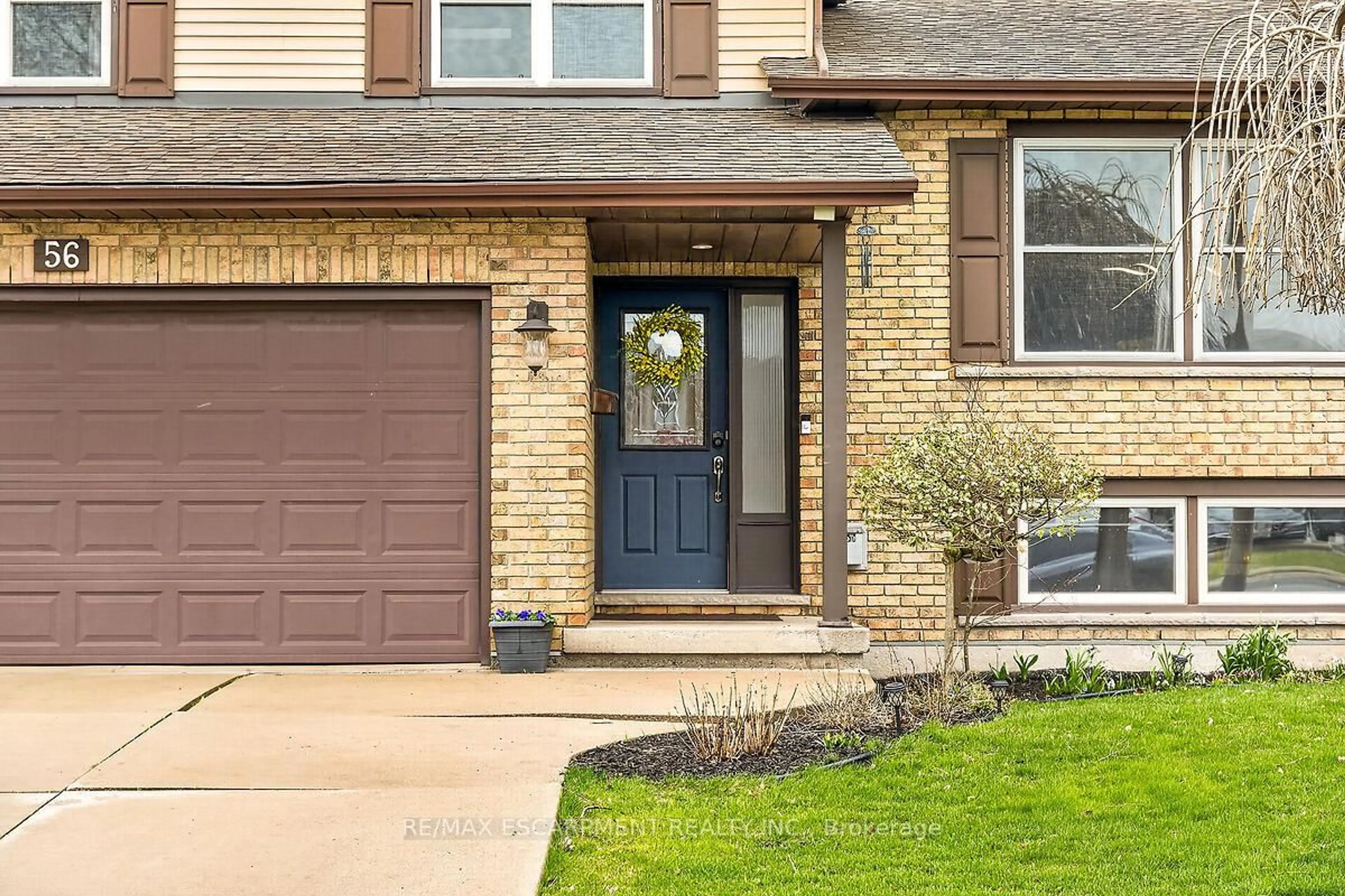 Home with brick exterior material, street for 56 Hummingbird Lane, Hamilton Ontario L9A 4A9