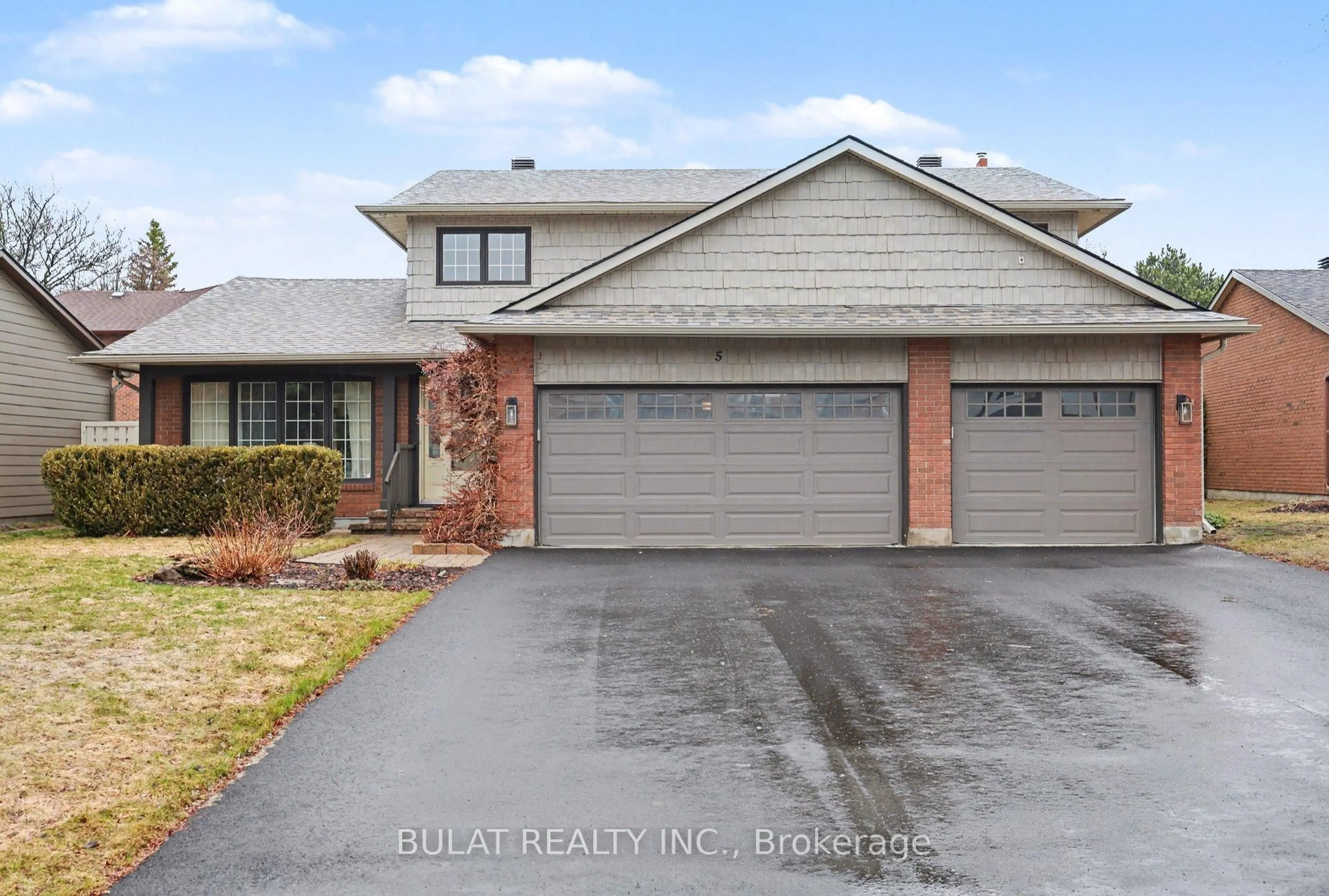 Home with brick exterior material, street for 5 Woodthrush Green, Ottawa Ontario K1V 0A9