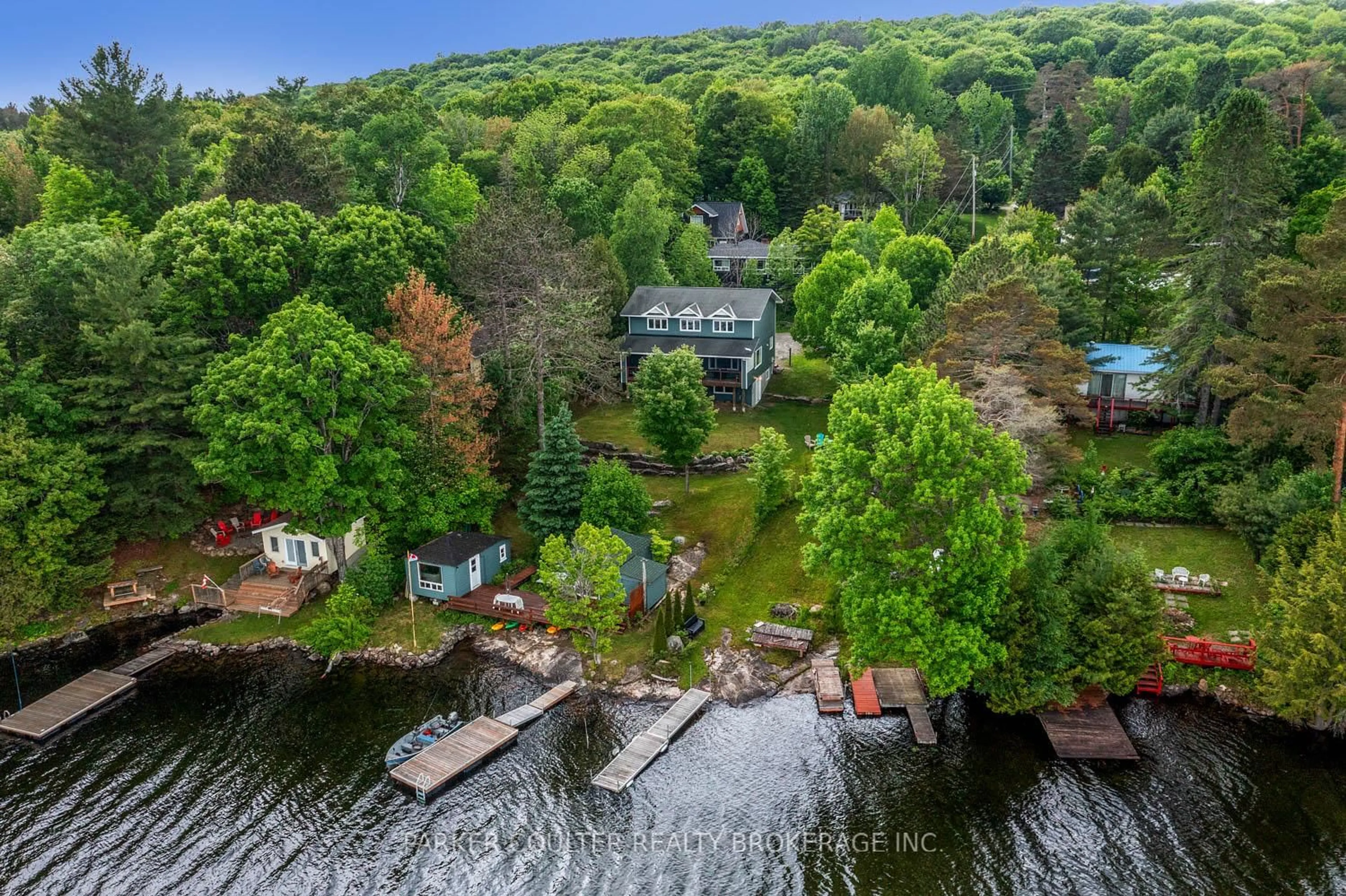 A pic from outside/outdoor area/front of a property/back of a property/a pic from drone, water/lake/river/ocean view for 1033 Harvest Moon Lane, Algonquin Highlands Ontario K0M 1S0