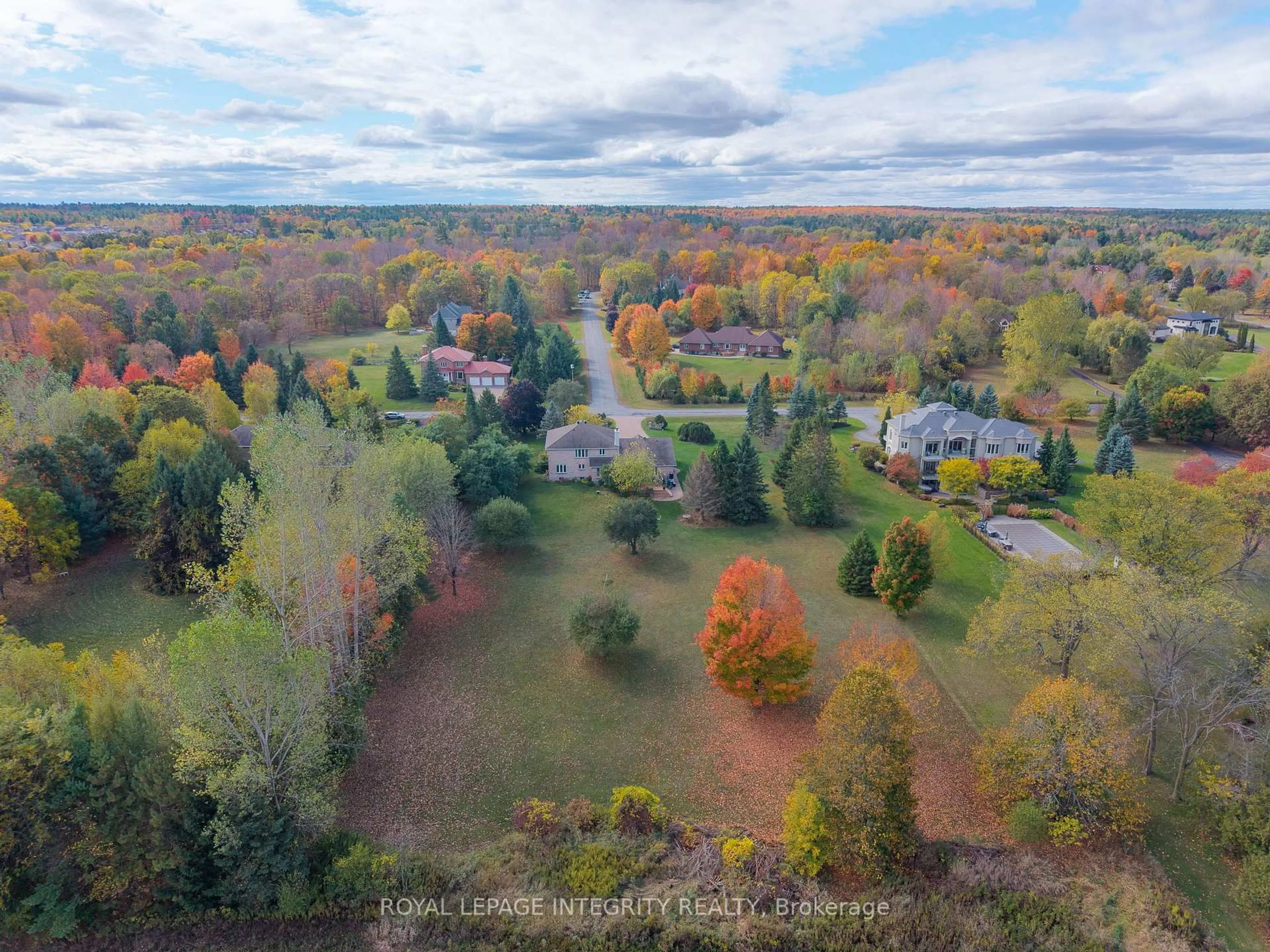 A pic from outside/outdoor area/front of a property/back of a property/a pic from drone, forest/trees view for 6 Marchbrook Circ, Ottawa Ontario K2W 1A1