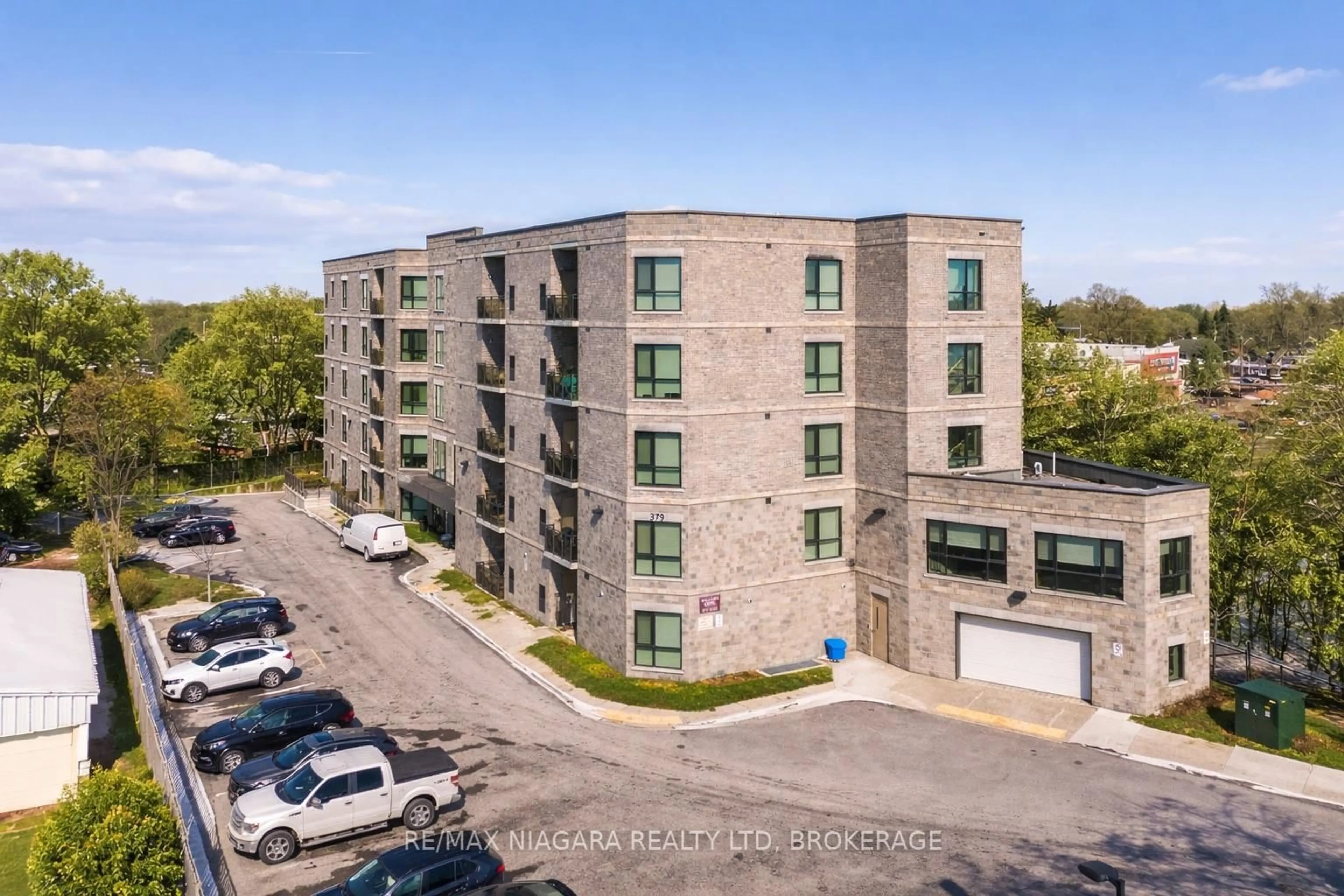 A pic from outside/outdoor area/front of a property/back of a property/a pic from drone, building for 379 Scott St #209, St. Catharines Ontario L2M 3W2