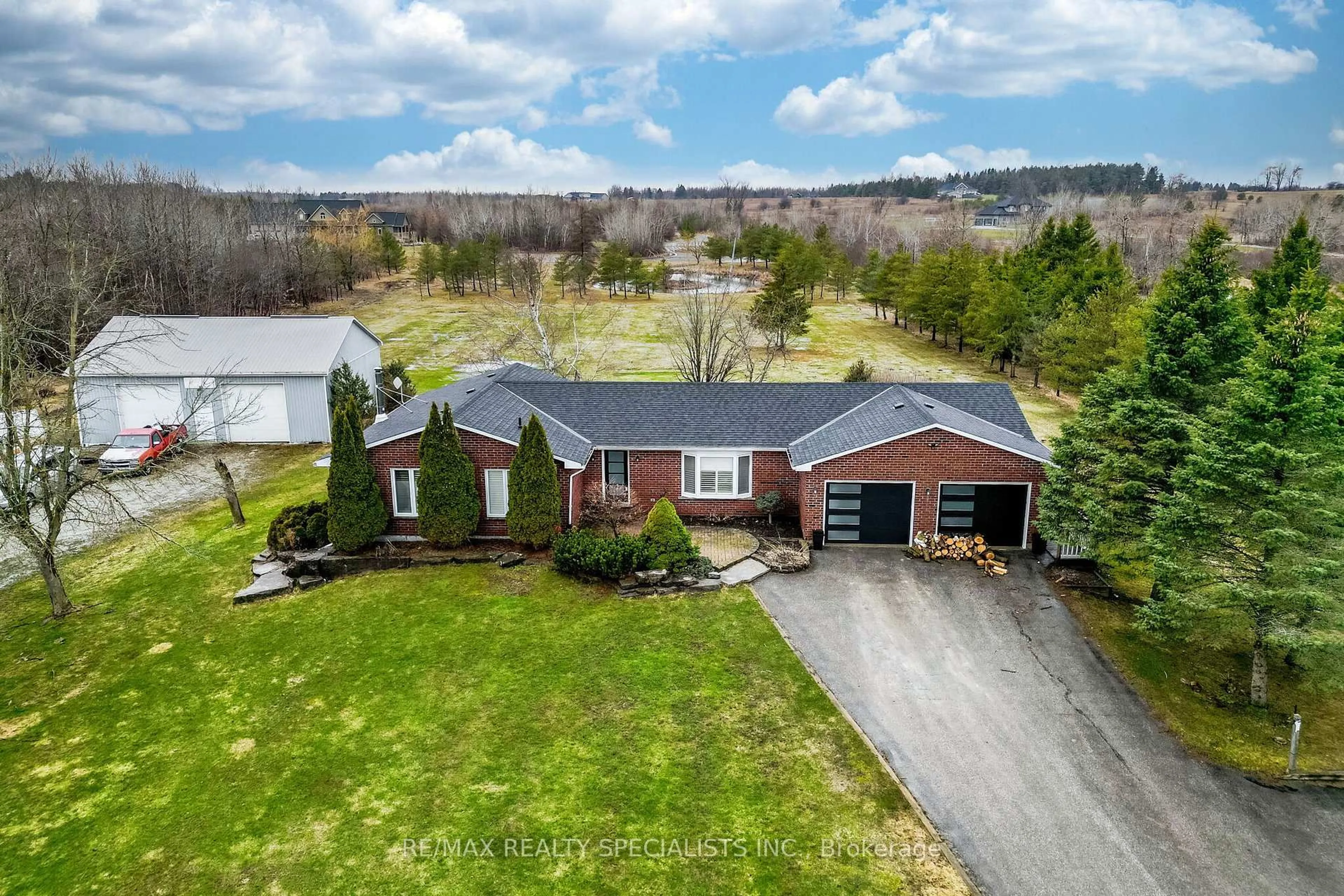 A pic from outside/outdoor area/front of a property/back of a property/a pic from drone, unknown for 513450 2nd Line, Amaranth Ontario L9W 0S4