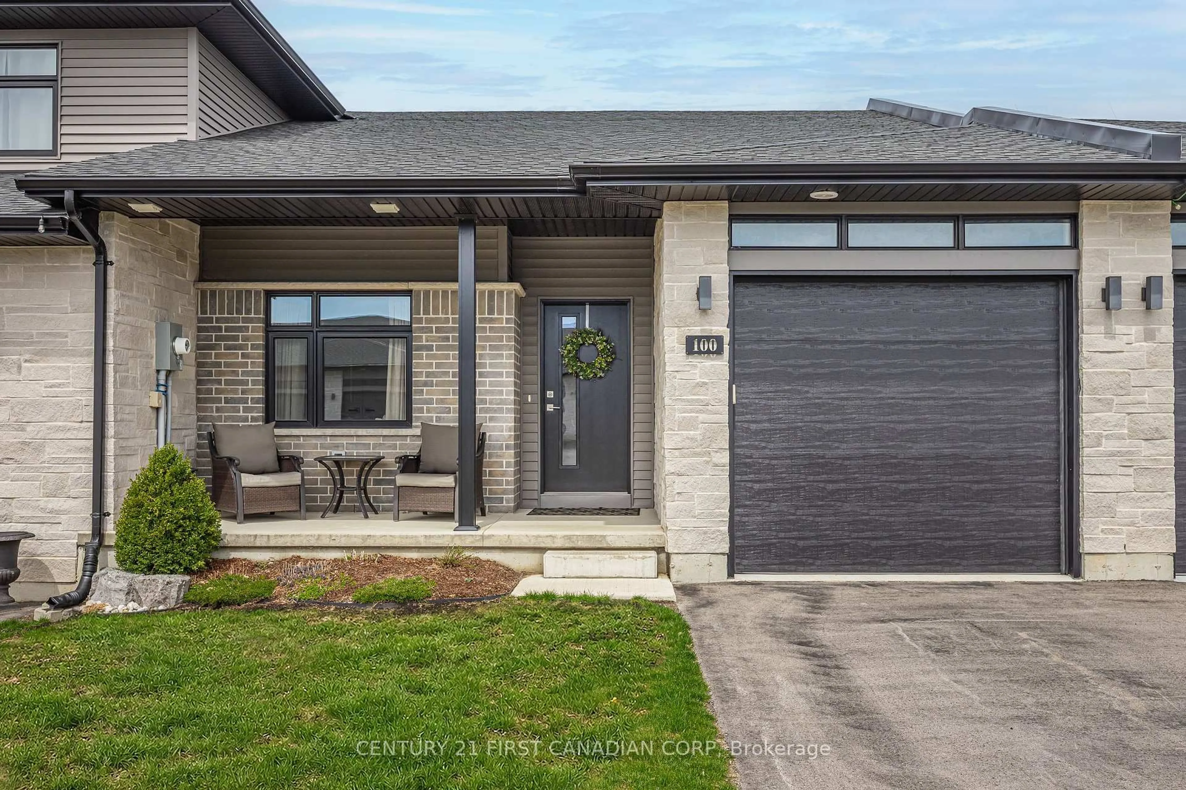 Home with brick exterior material, street for 100 Rowe Ave, South Huron Ontario N0M 1S1