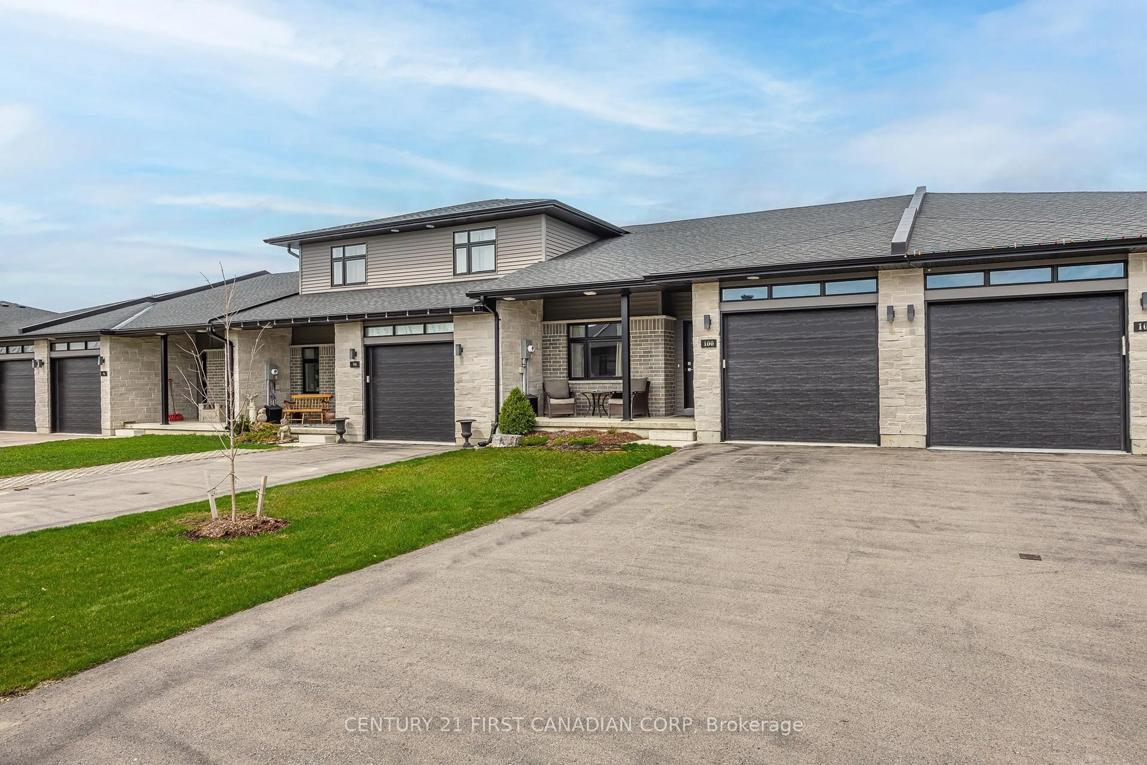 Home with brick exterior material, street for 100 Rowe Ave, South Huron Ontario N0M 1S1