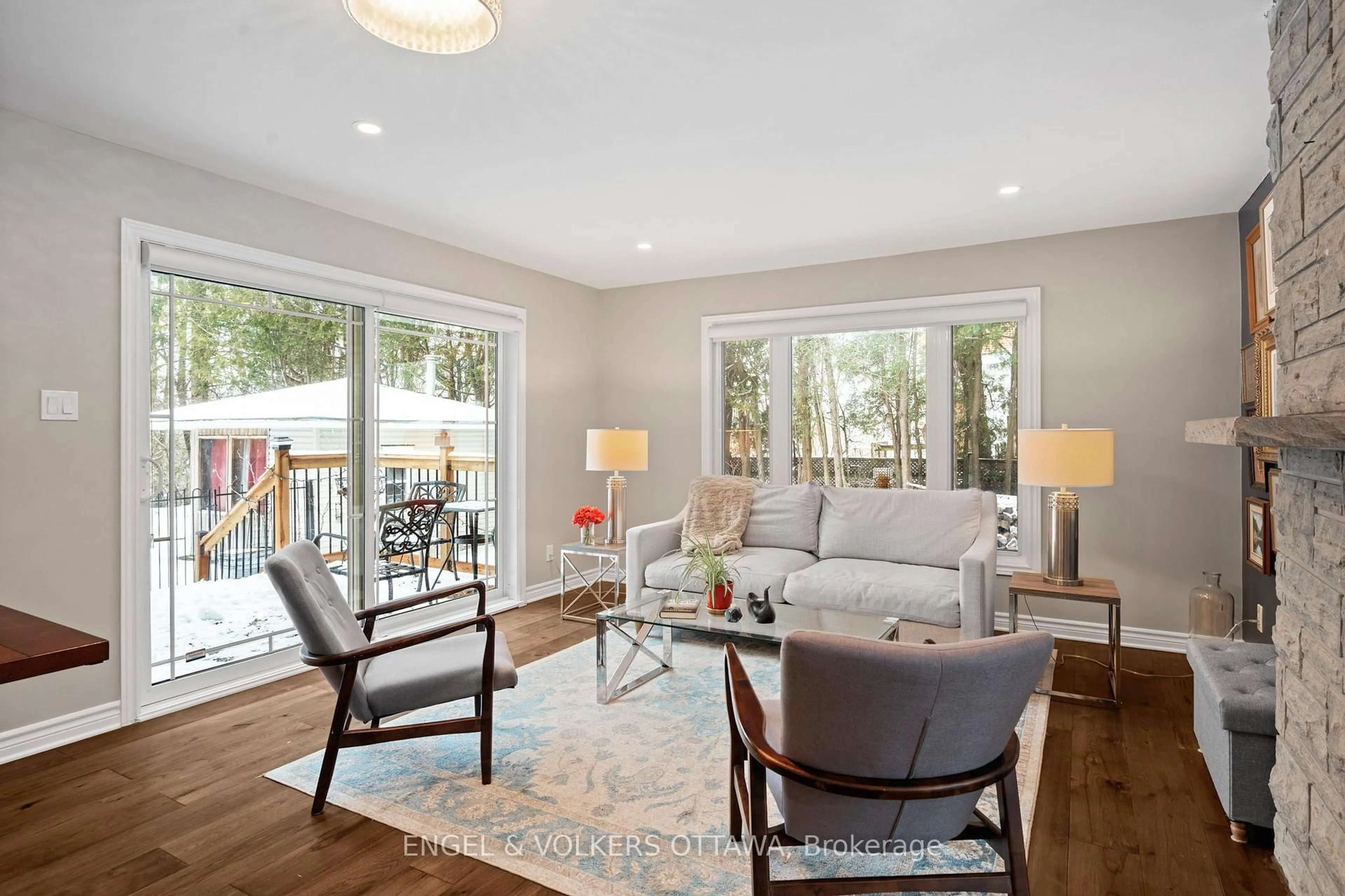 Living room with furniture, wood/laminate floor for 3 Hazelwood Way, Ottawa Ontario K2C 3H1