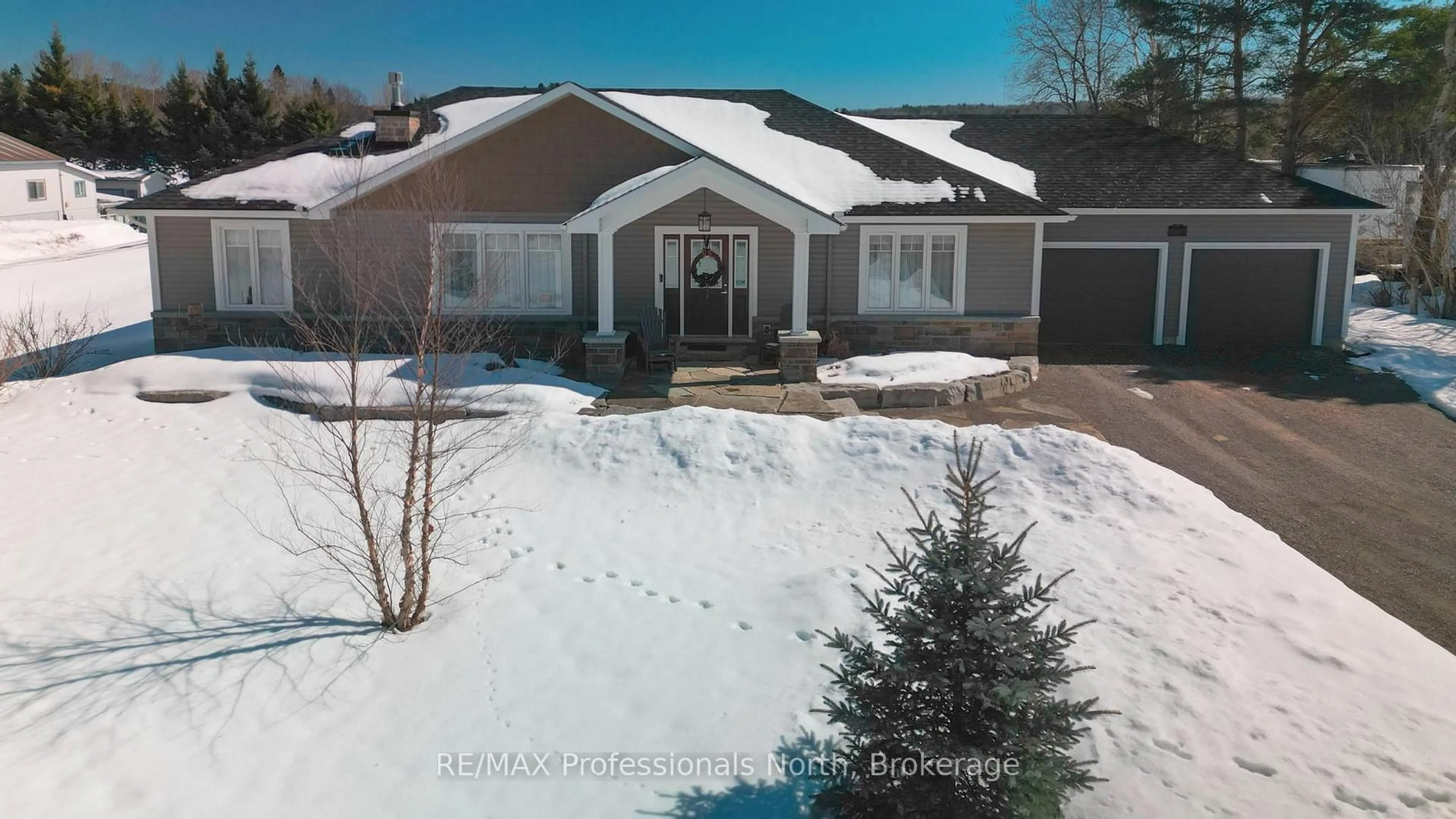 A pic from outside/outdoor area/front of a property/back of a property/a pic from drone, street for 192 Bobcaygeon Rd, Minden Hills Ontario K0M 2K0