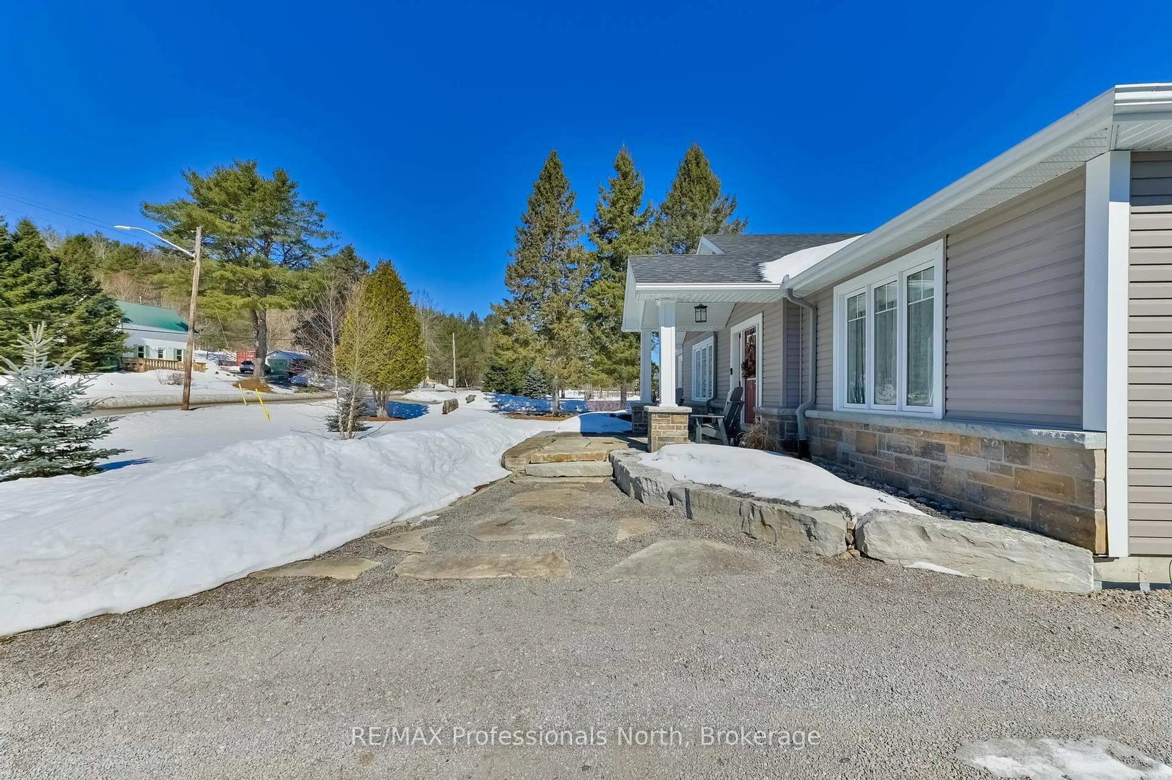 A pic from outside/outdoor area/front of a property/back of a property/a pic from drone, mountain view for 192 Bobcaygeon Rd, Minden Hills Ontario K0M 2K0