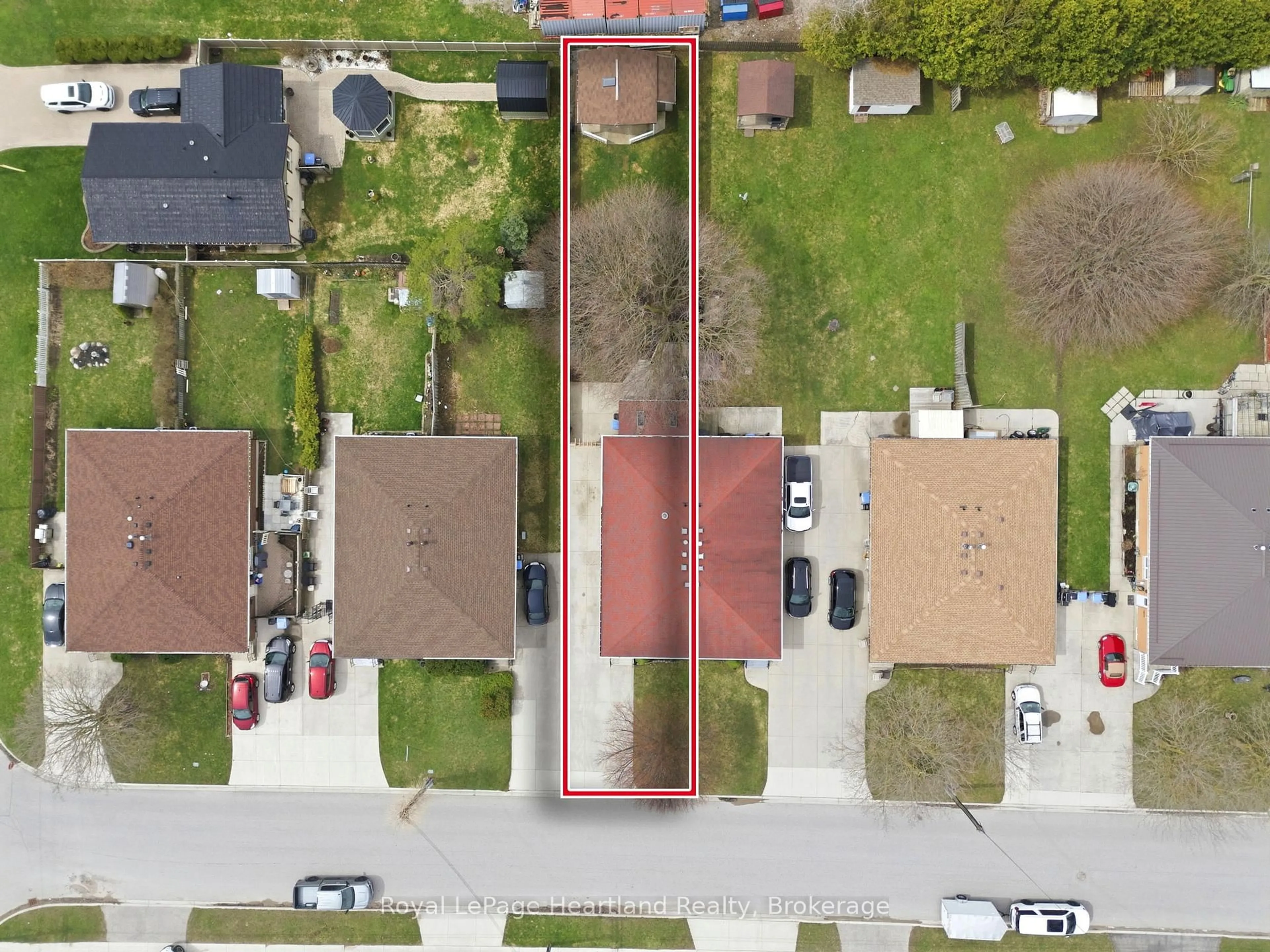 A pic from outside/outdoor area/front of a property/back of a property/a pic from drone, street for 85 Orchard St, South Huron Ontario N0M 1S3