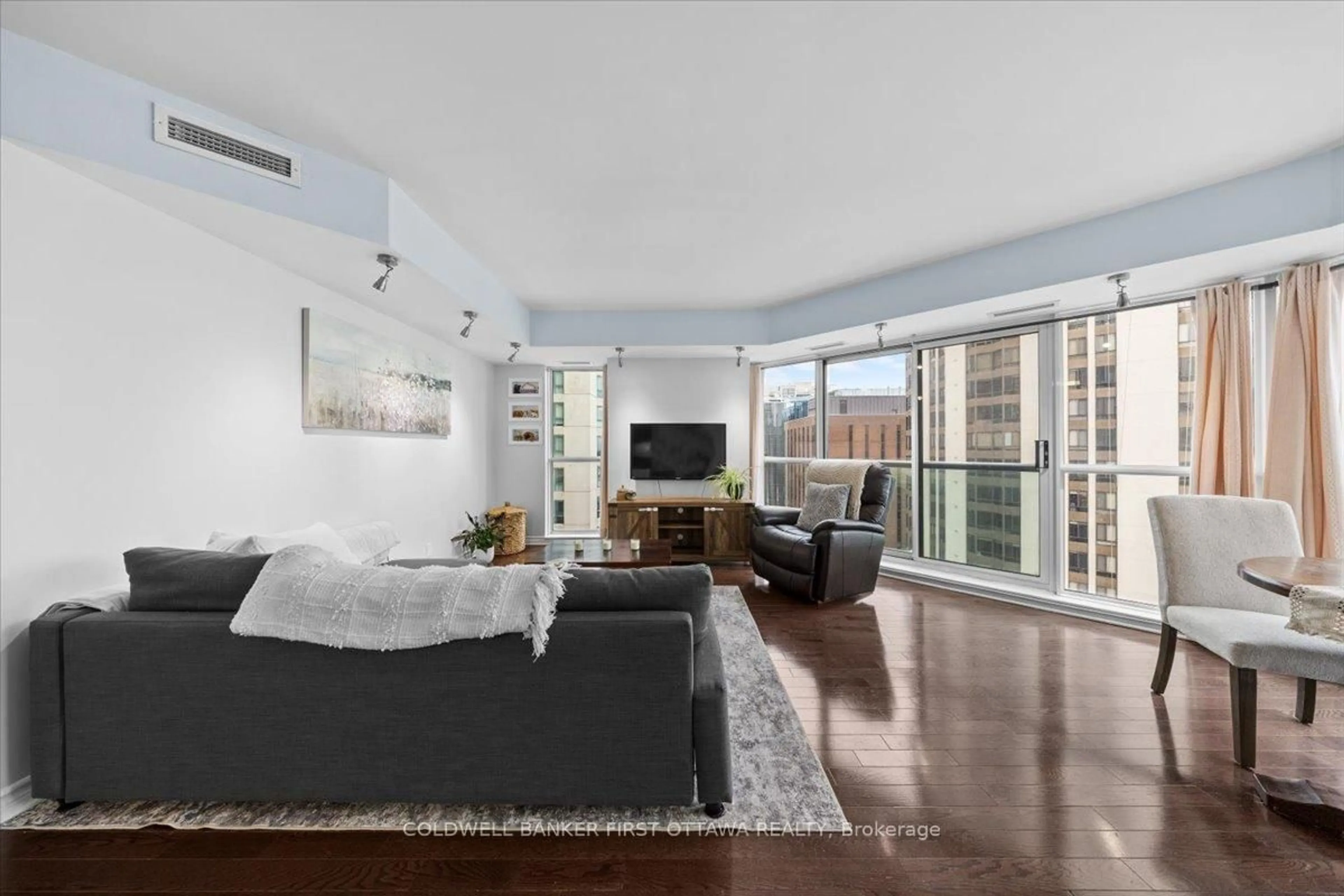 Living room with furniture, unknown for 445 Laurier Ave #1401, Ottawa Ontario K1N 6R4