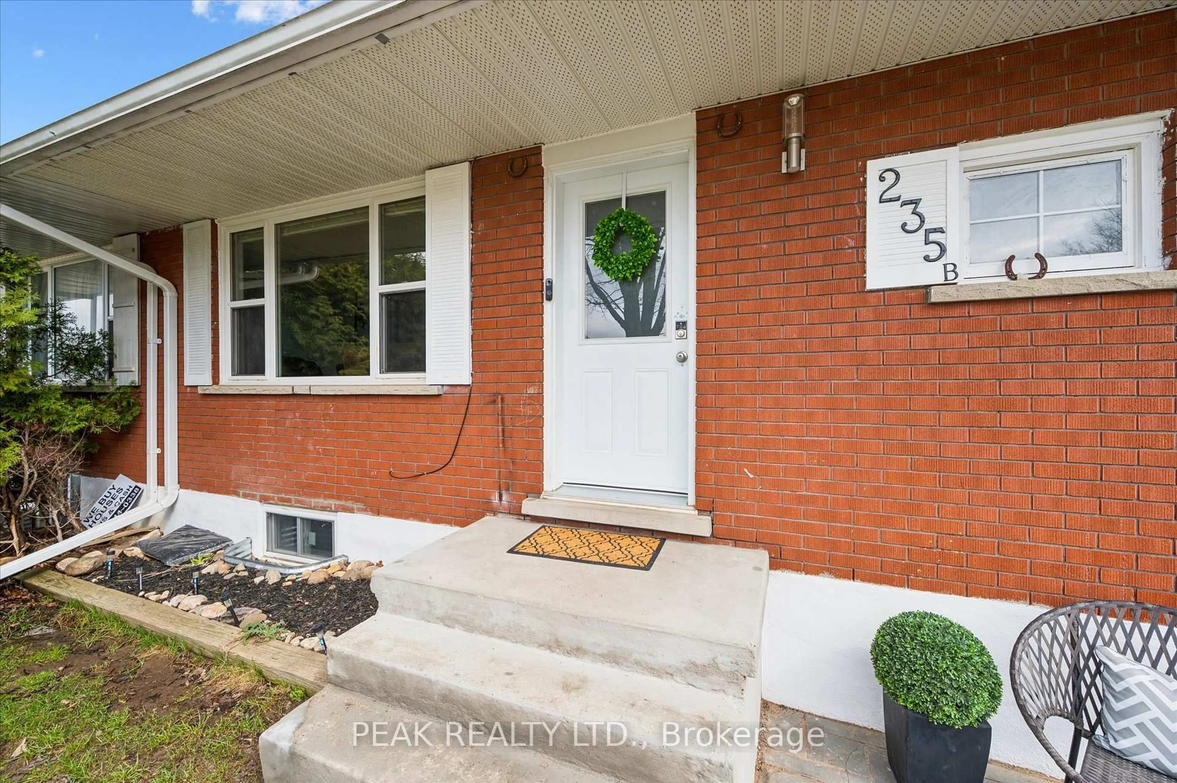 Home with brick exterior material, street for 235 CEDARBRAE Ave #B, Waterloo Ontario N2L 4S8