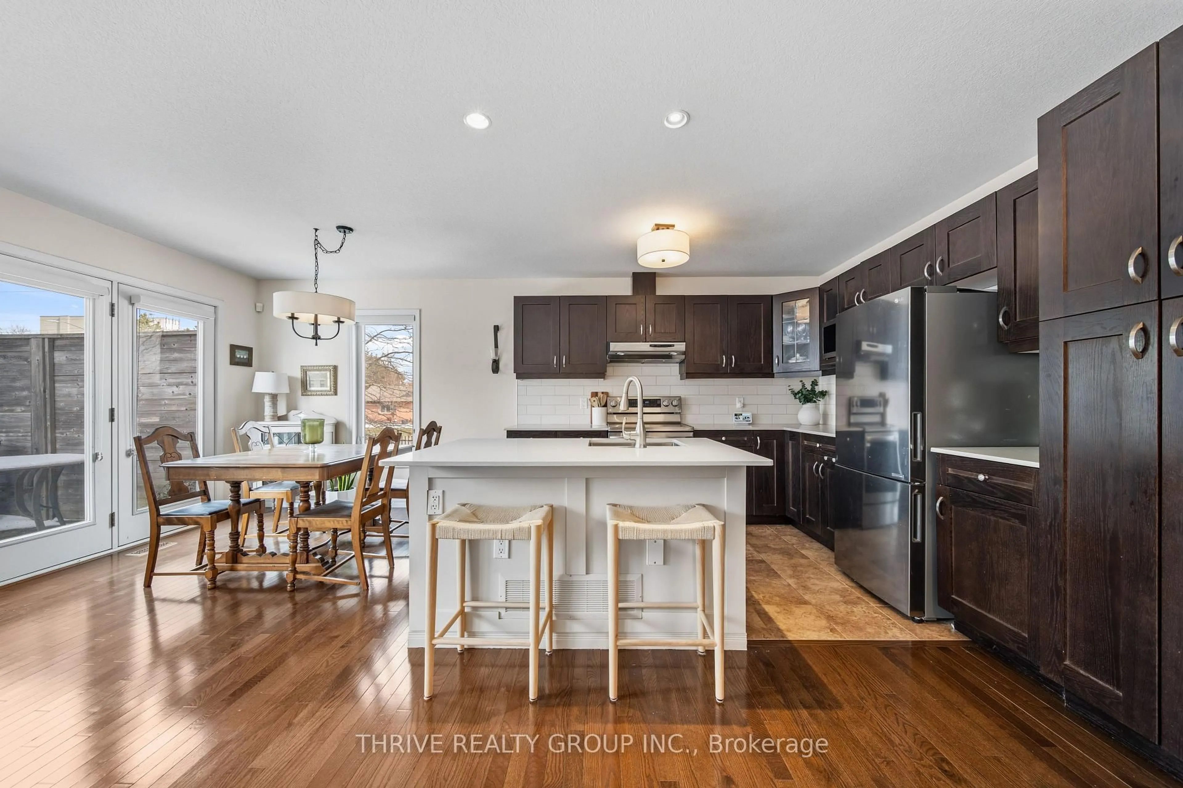 Open concept kitchen, wood/laminate floor for 582 HYDE PARK Rd #2, London North Ontario N6H 3S1