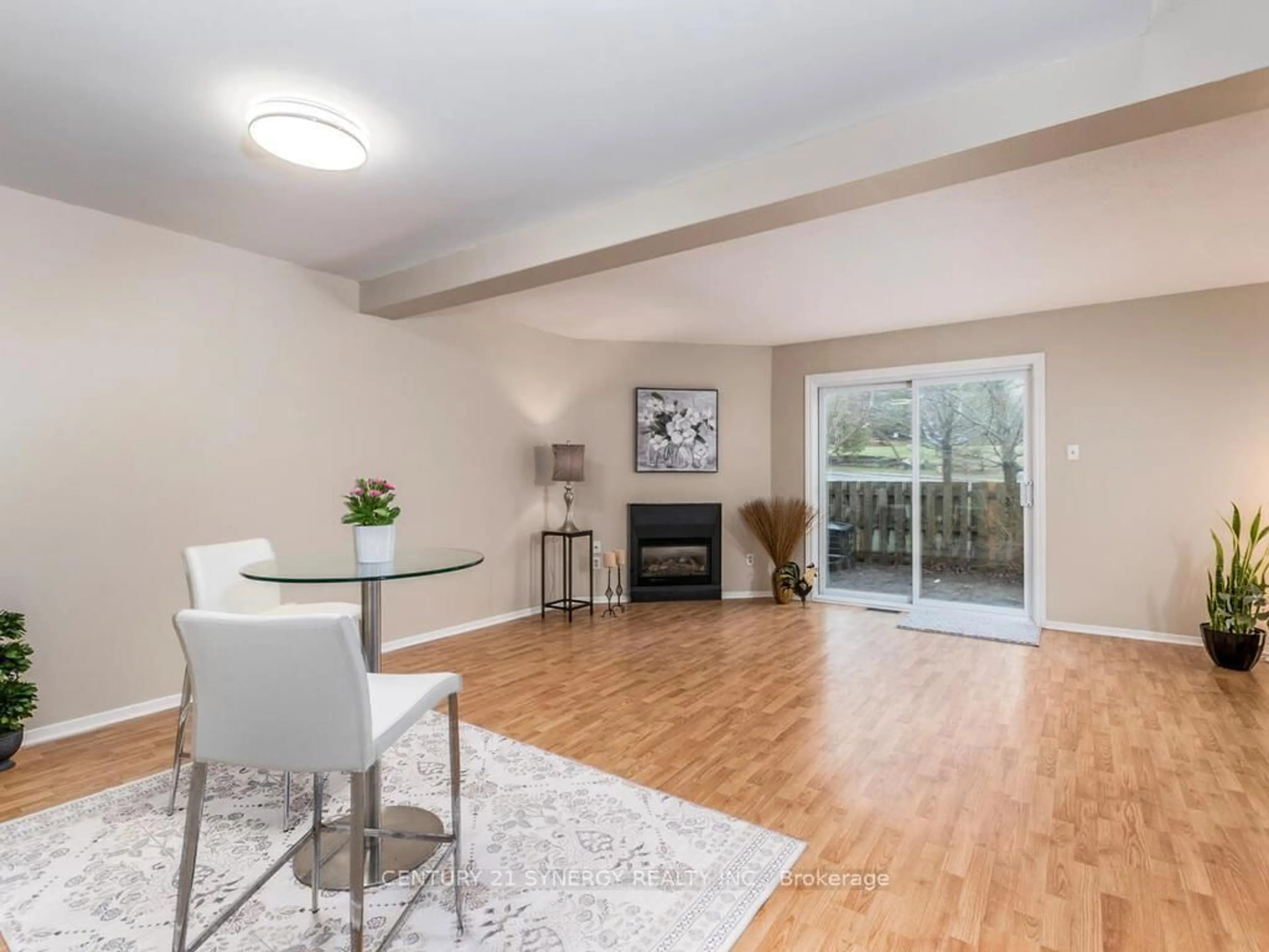 Living room with furniture, wood/laminate floor for 71 Clarkson Cres #16, Ottawa Ontario K2L 3C9